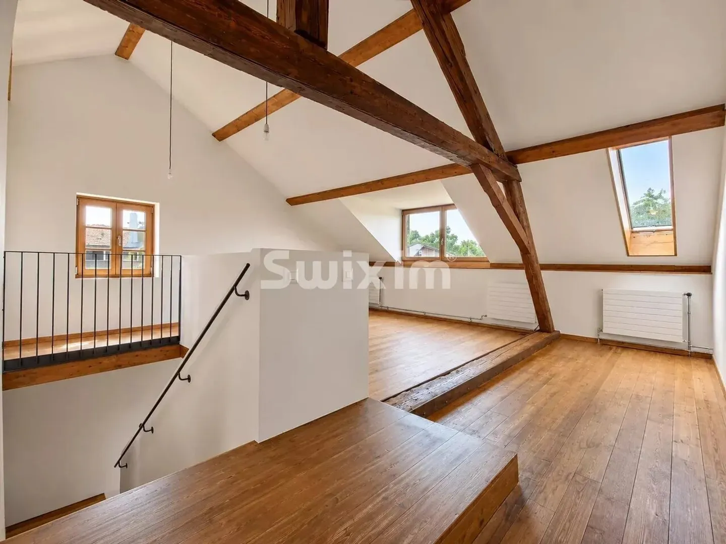 À Anières, une maison de 6,5 pièces dans une ancienne laiterie entièrement rénovée - Photo 3 sur 3