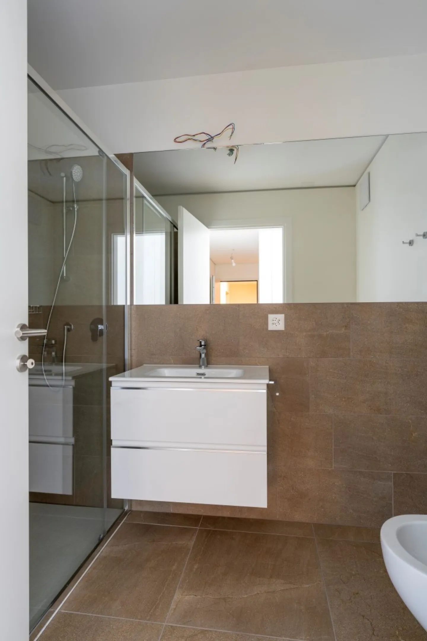 Appartamento in Vendita nella Residenza Querciabella a Bioggio con Vista Lago - Foto 9 di 10