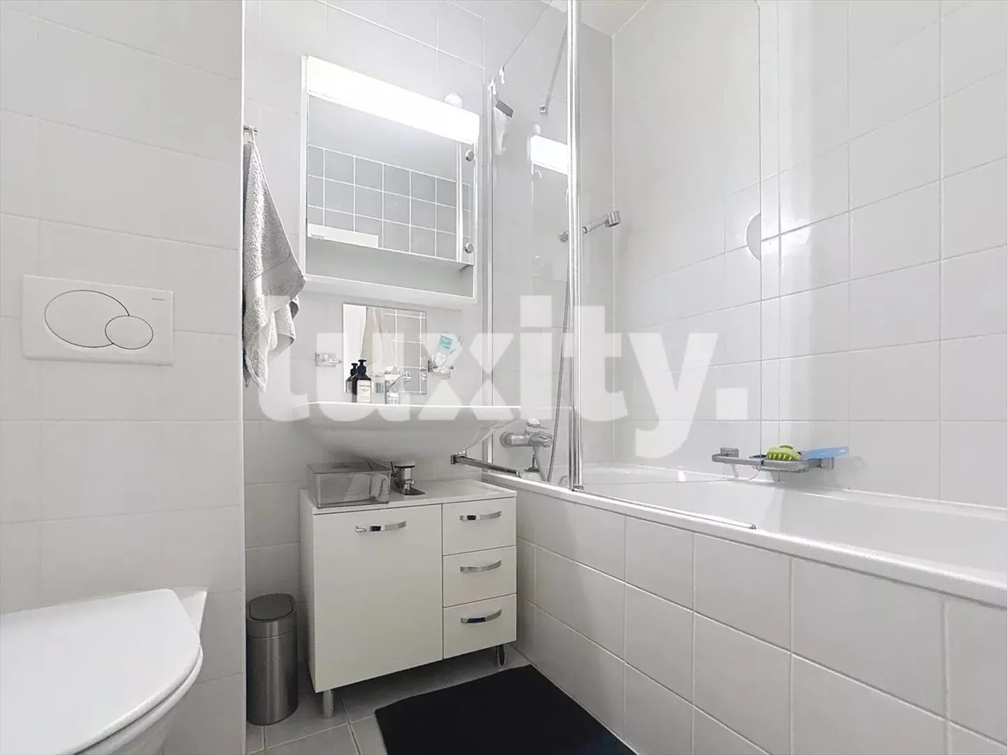 Appartement 5.5 pièces - Photo 8 sur 9