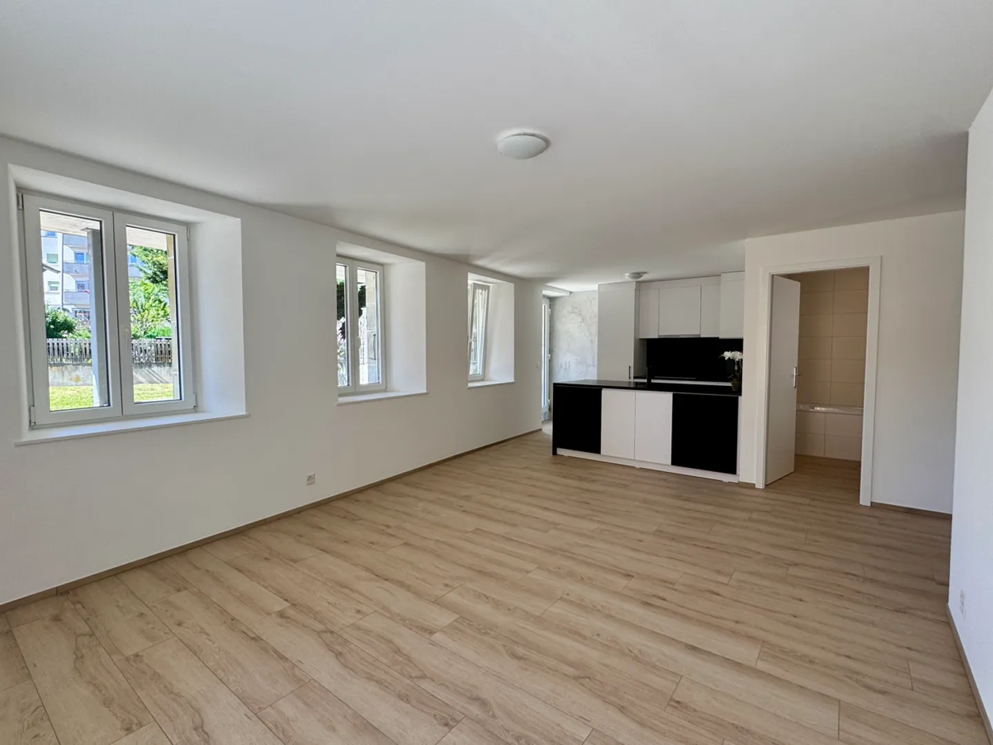 Appartement rénové avec jardin - Photo 1 sur 7