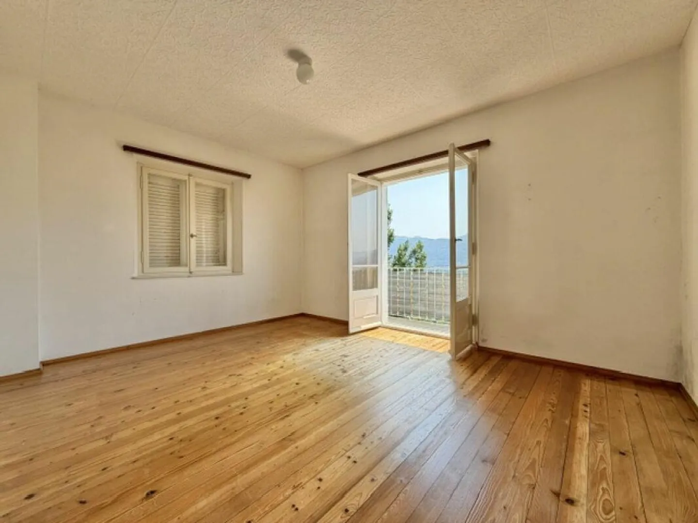 À VENDRE À LAVERTEZZO - TERRAIN À BATIR AVEC VUE SUR LE MAGADINO... - Photo 12 sur 23