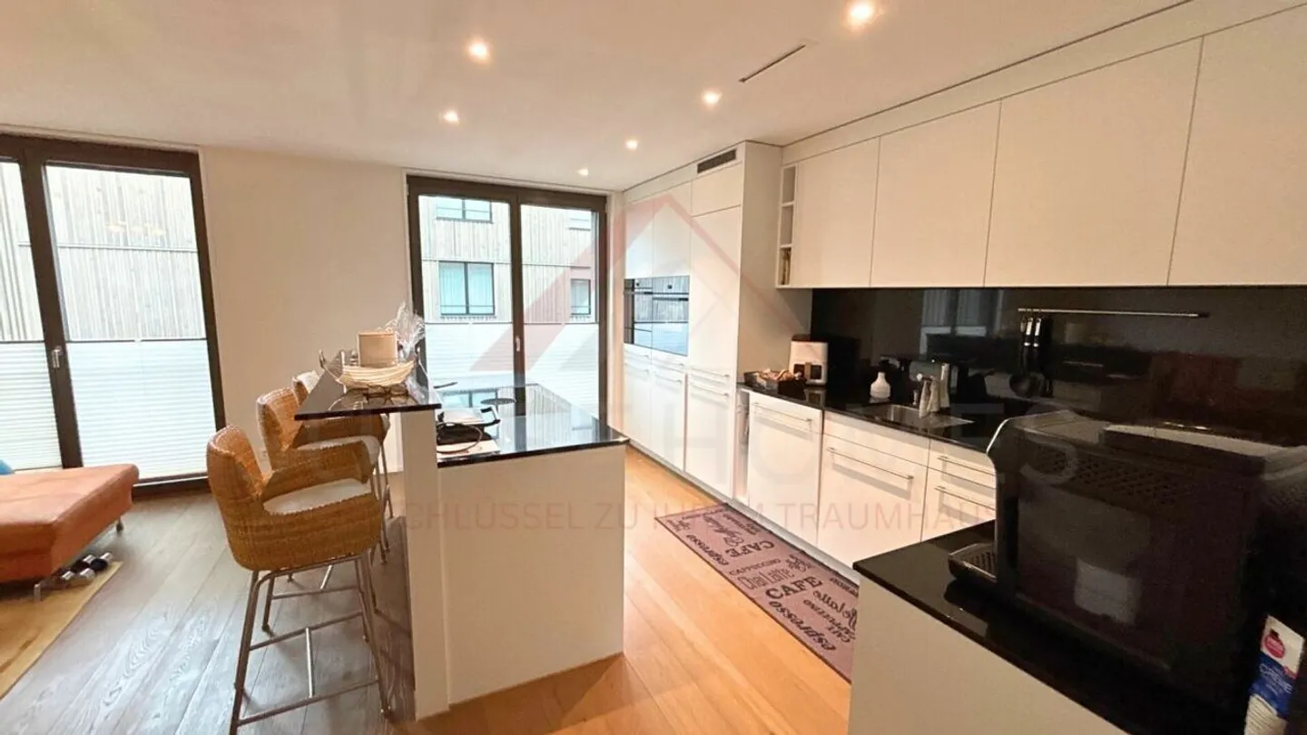 Moderne Maisonette mit Loggia - Foto 3 von 14