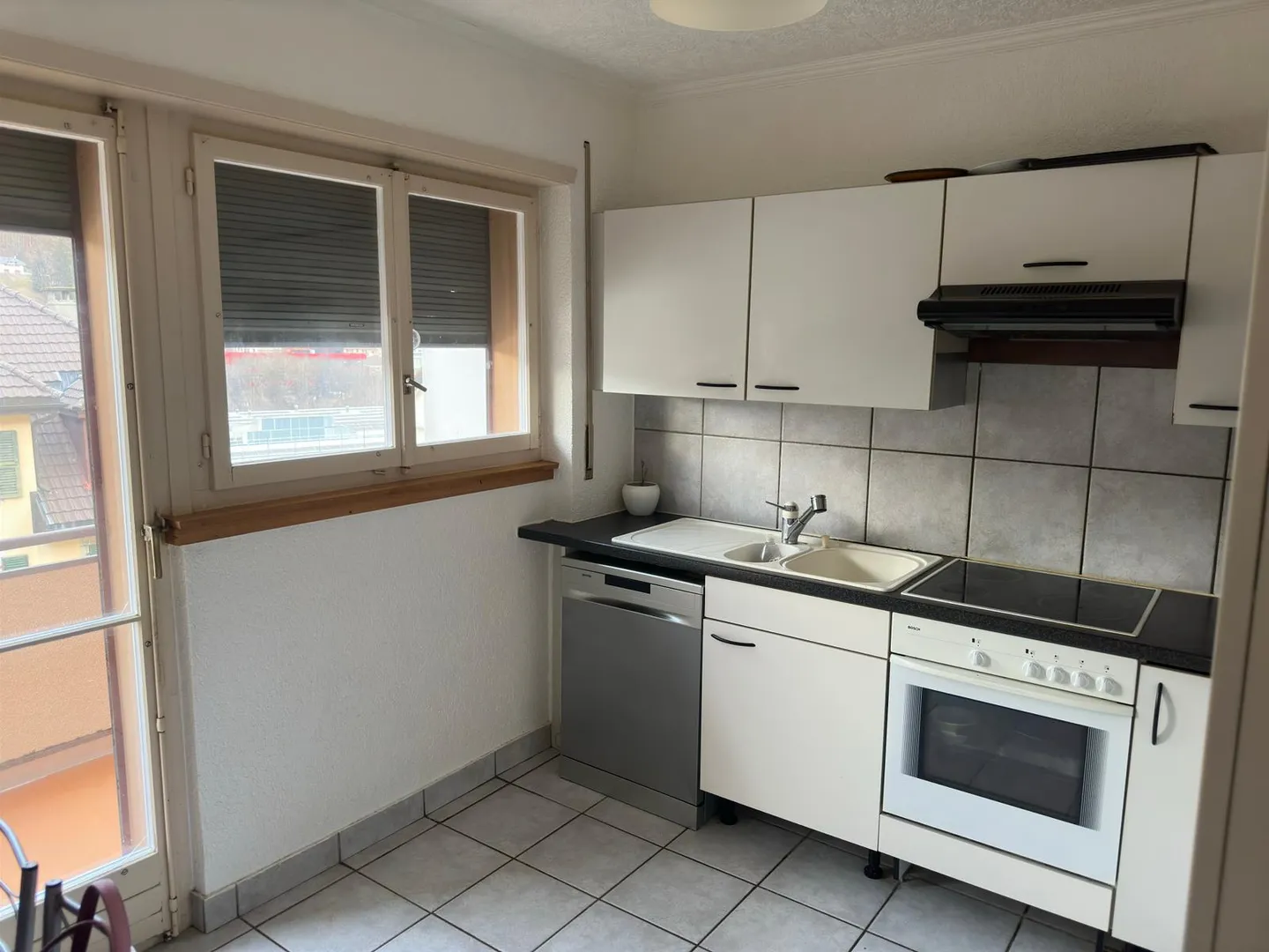 Appartement Charmant avec Balcons - Photo 2 sur 8