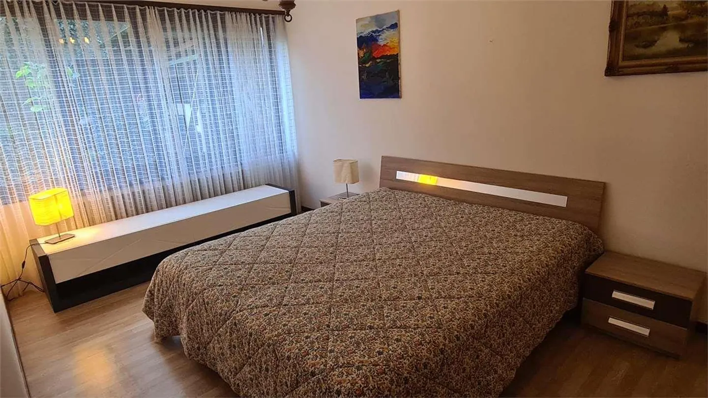COLLINA D'ORO: GROßE 2,5-ZIMMER-WOHNUNG MIT GARTEN - Foto 7 von 8