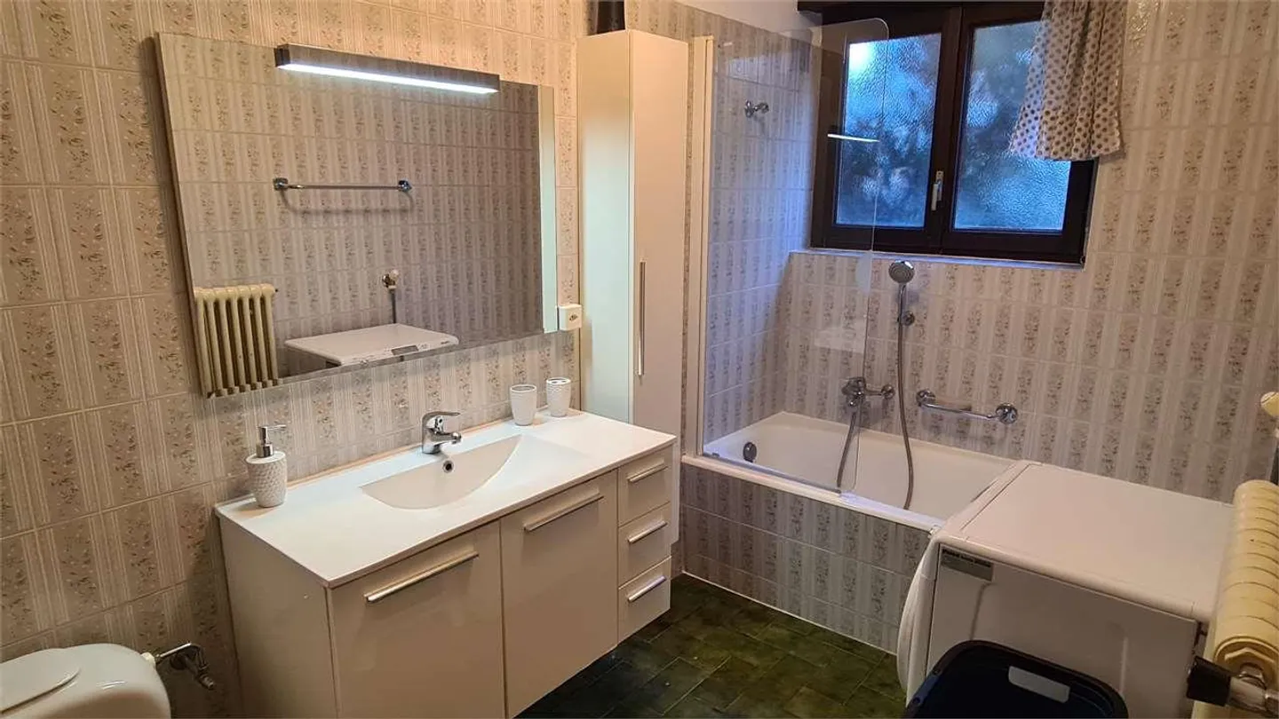 COLLINA D'ORO: GROßE 2,5-ZIMMER-WOHNUNG MIT GARTEN - Foto 8 von 8