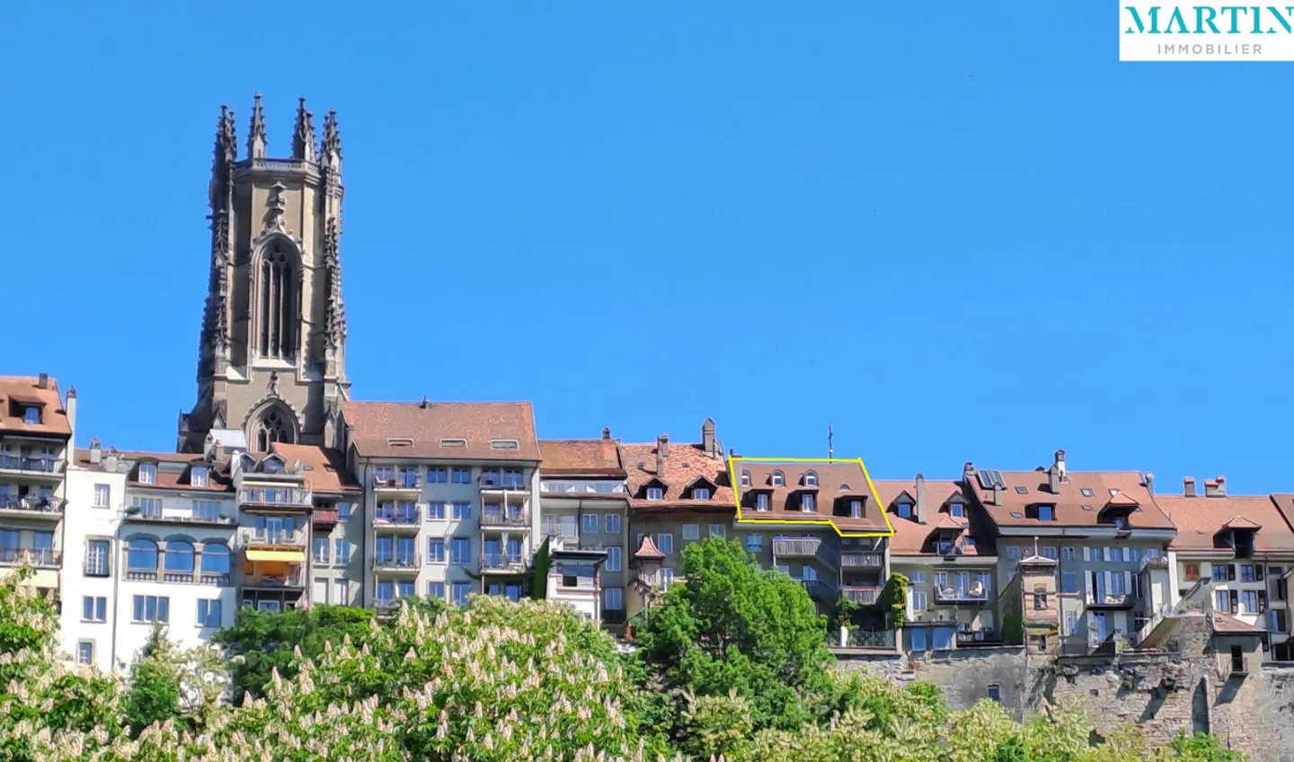 Beautiful penthouse apartment for sale in the heart of Freiburg's old town - Photo 1 of 10