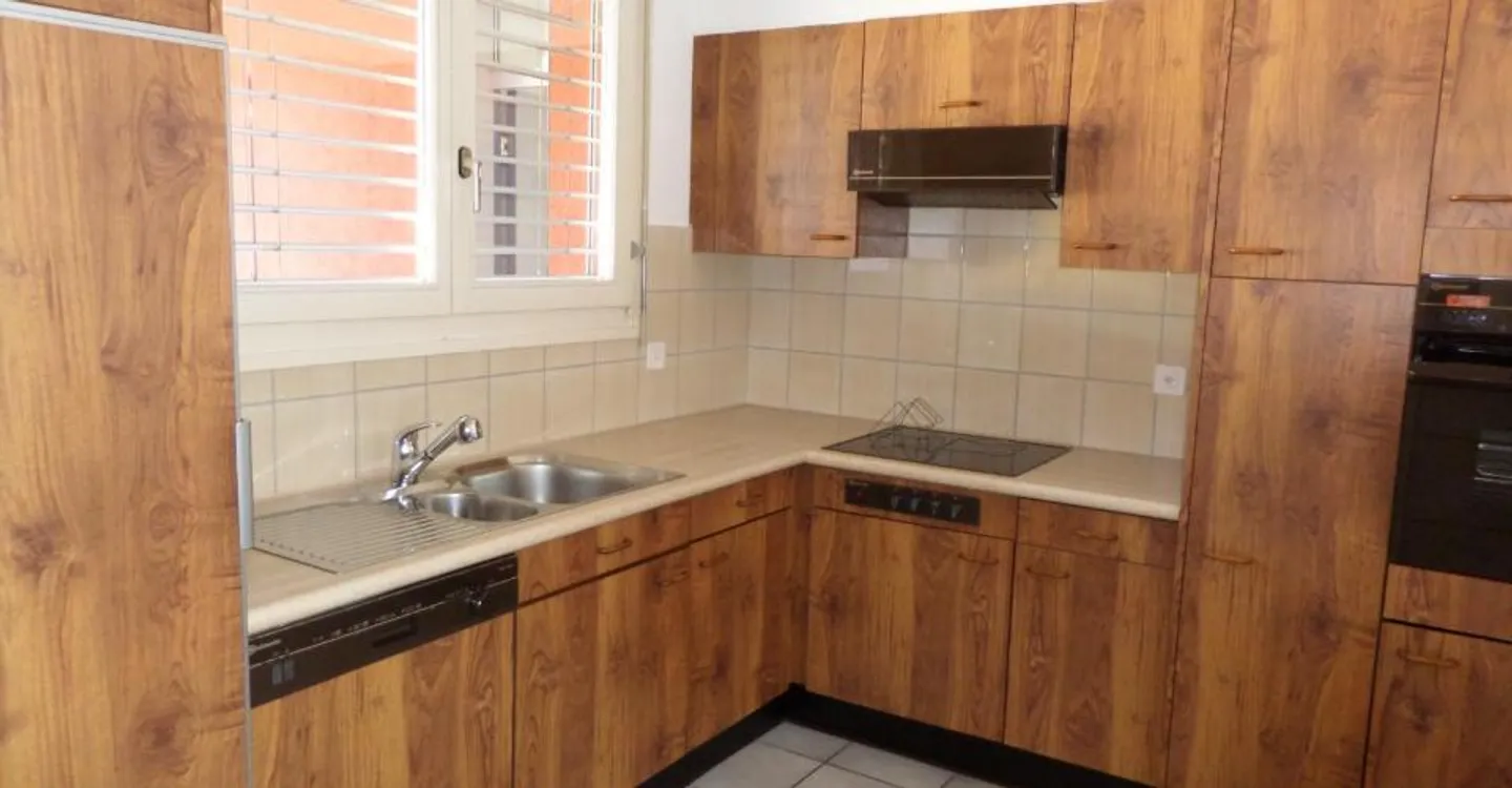 Appartement 2,5 pièces dans un quartier vert et calme - Photo 3 sur 5