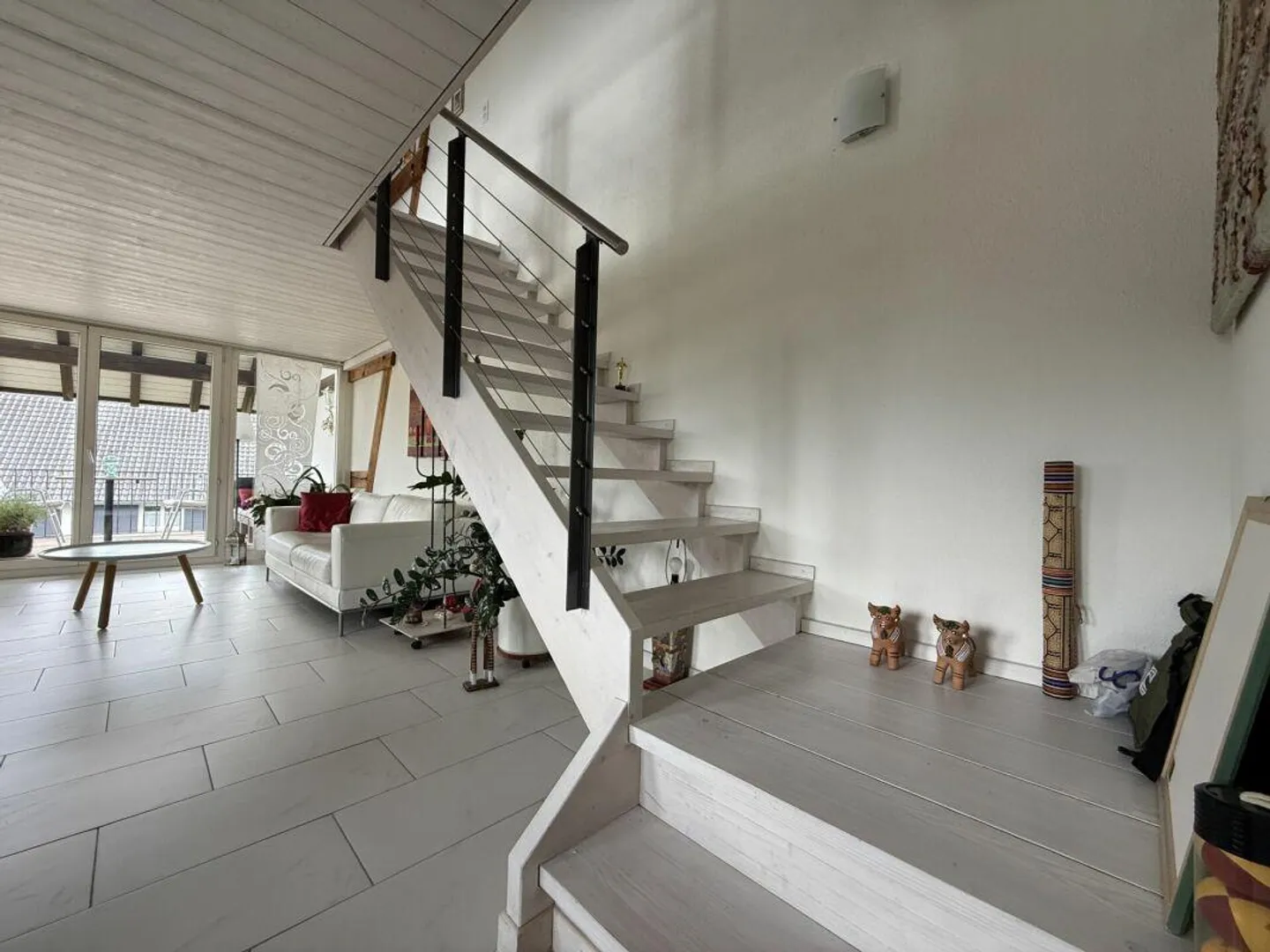 Appartement en duplex de 4,5 pièces - Photo 4 sur 9