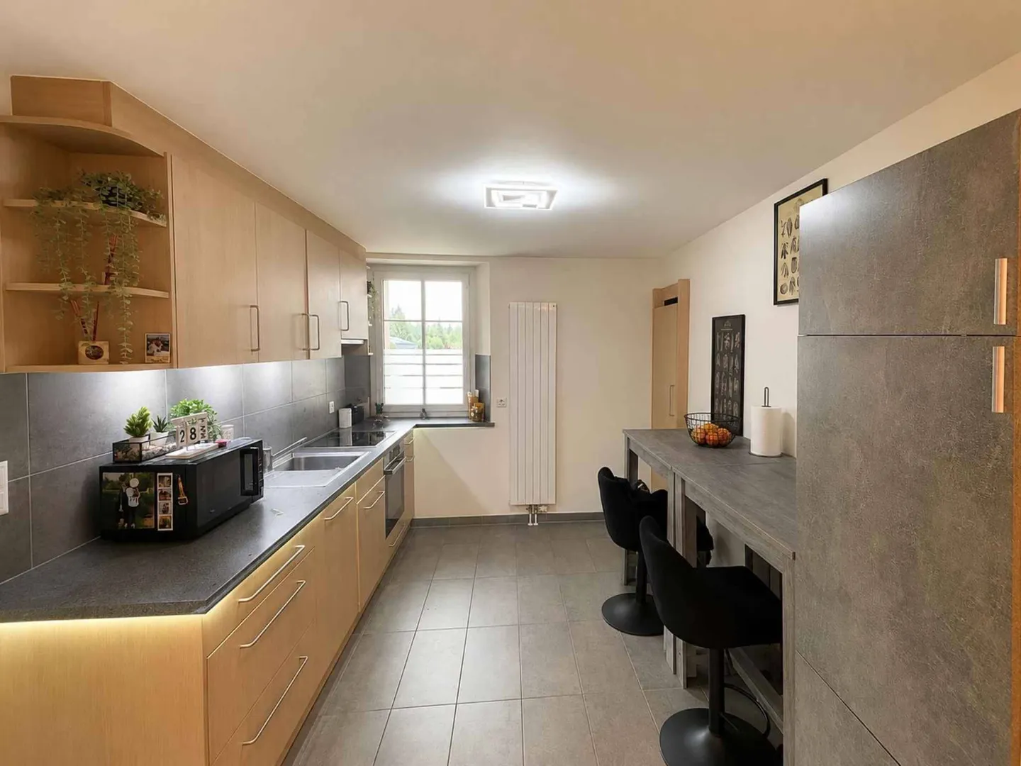 Appartement Charmant dans un Quartier Calme - Photo 3 sur 4