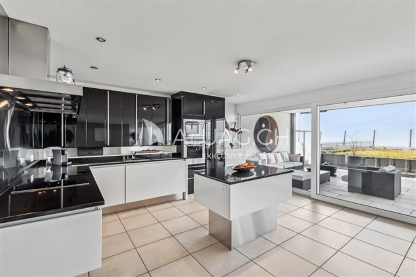 MODERN CONDOMINIUM WITH LOTS OF SPACE - Photo 3 of 5