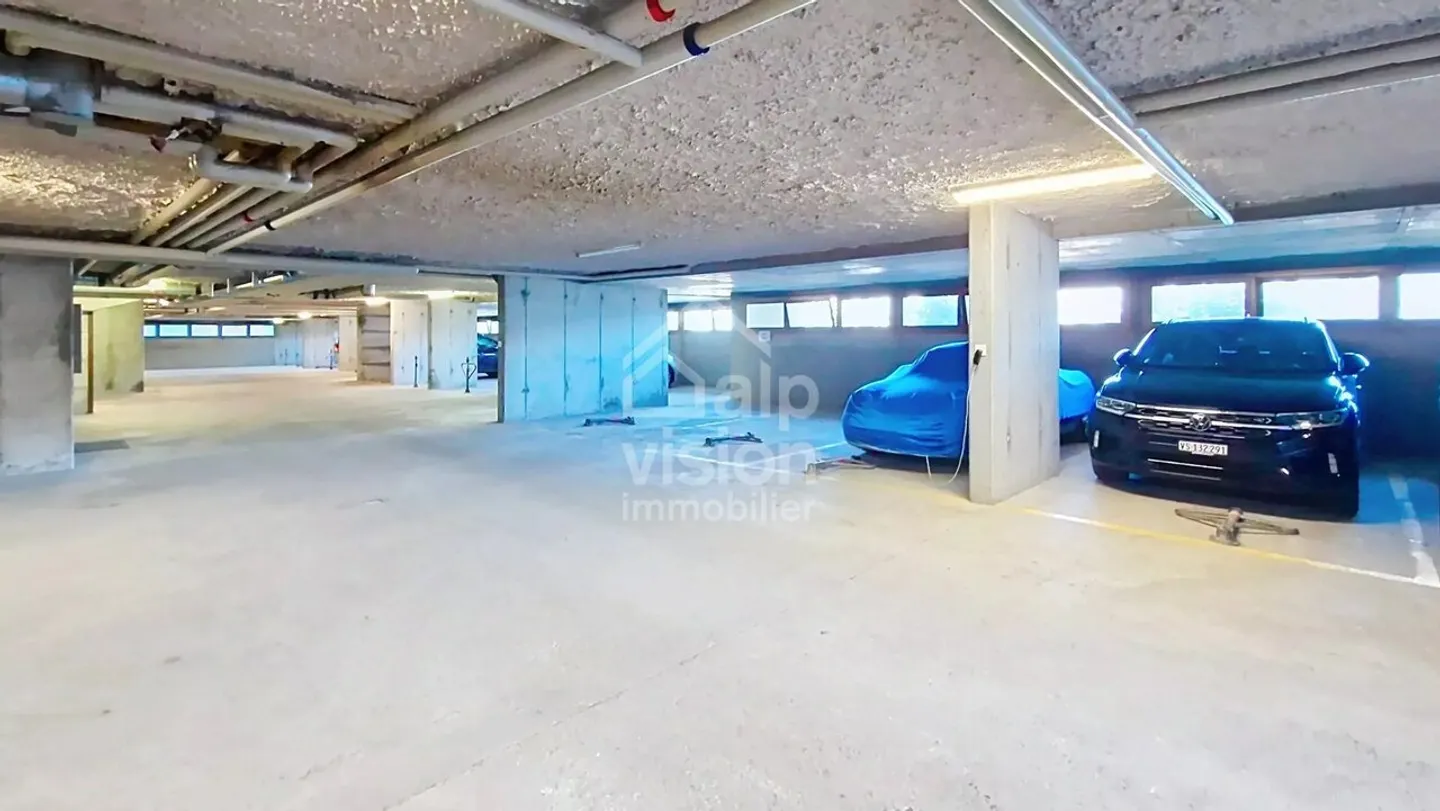 RARE OPPORTUNITY: COVERED PARKING IN THE CENTER OF VEYSONNAZ - Photo 3 of 7
