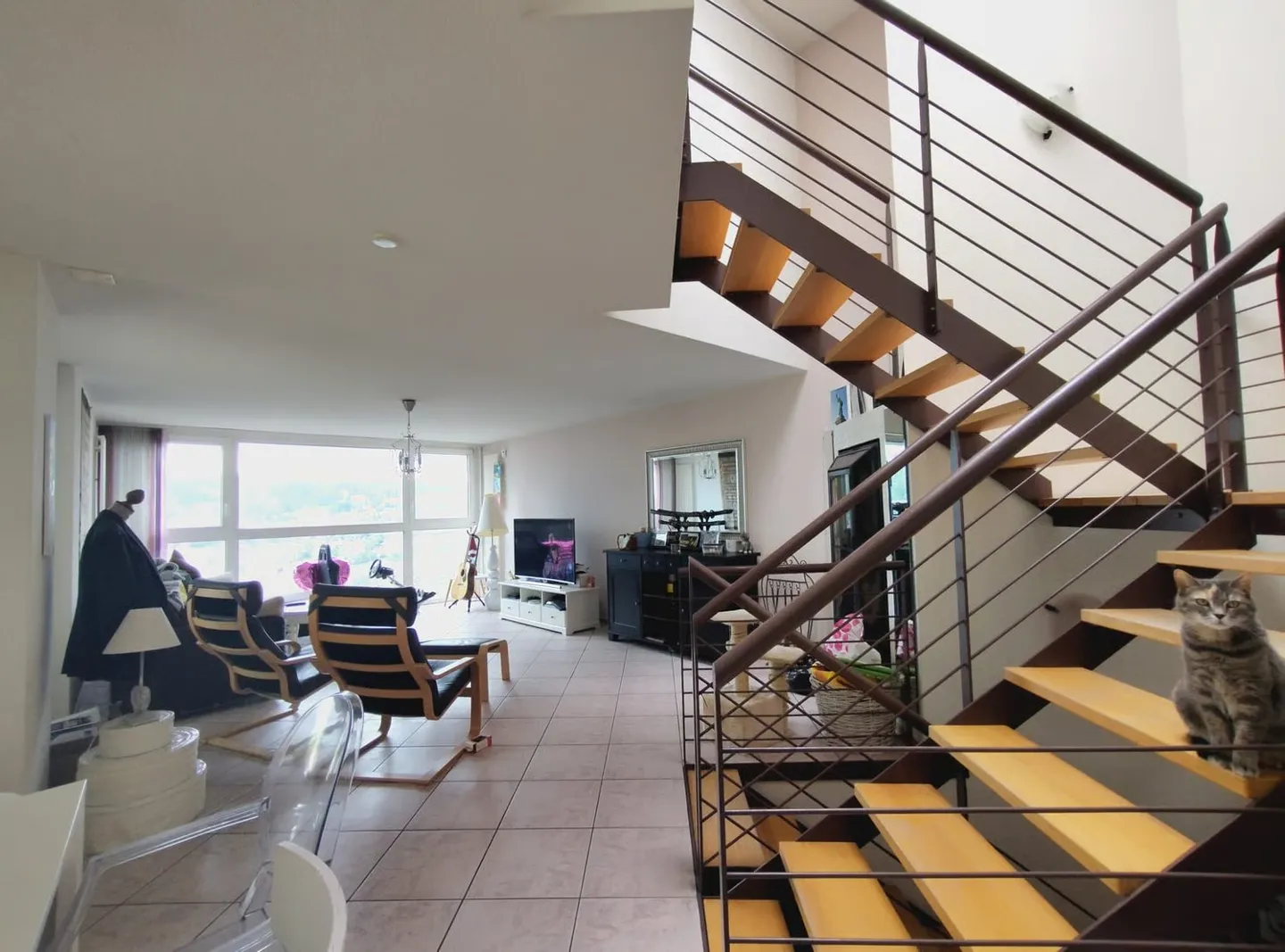 Single-family house with three levels, spacious and bright in La Chaux-de-Fonds - Photo 3 of 12