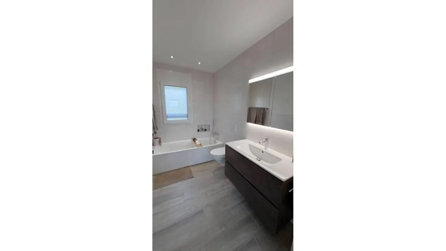 Modern Attic Apartment with Views - Photo 6 of 10