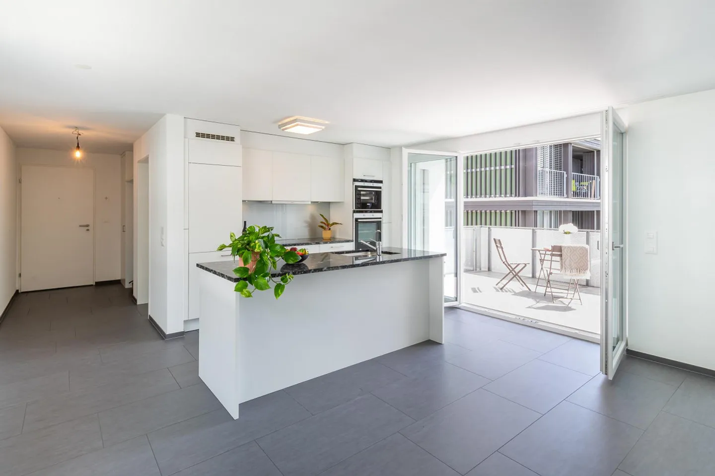 Central City Apartment with Beautiful South Balcony - Photo 4 of 15