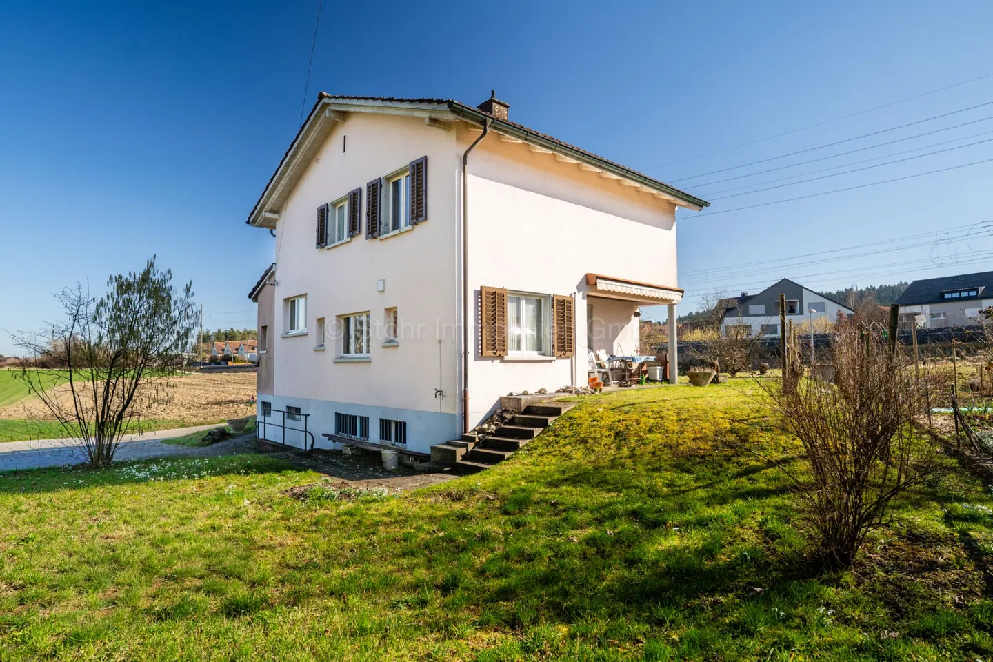 Bauland mit Einfamilienhaus - Foto 4 von 22