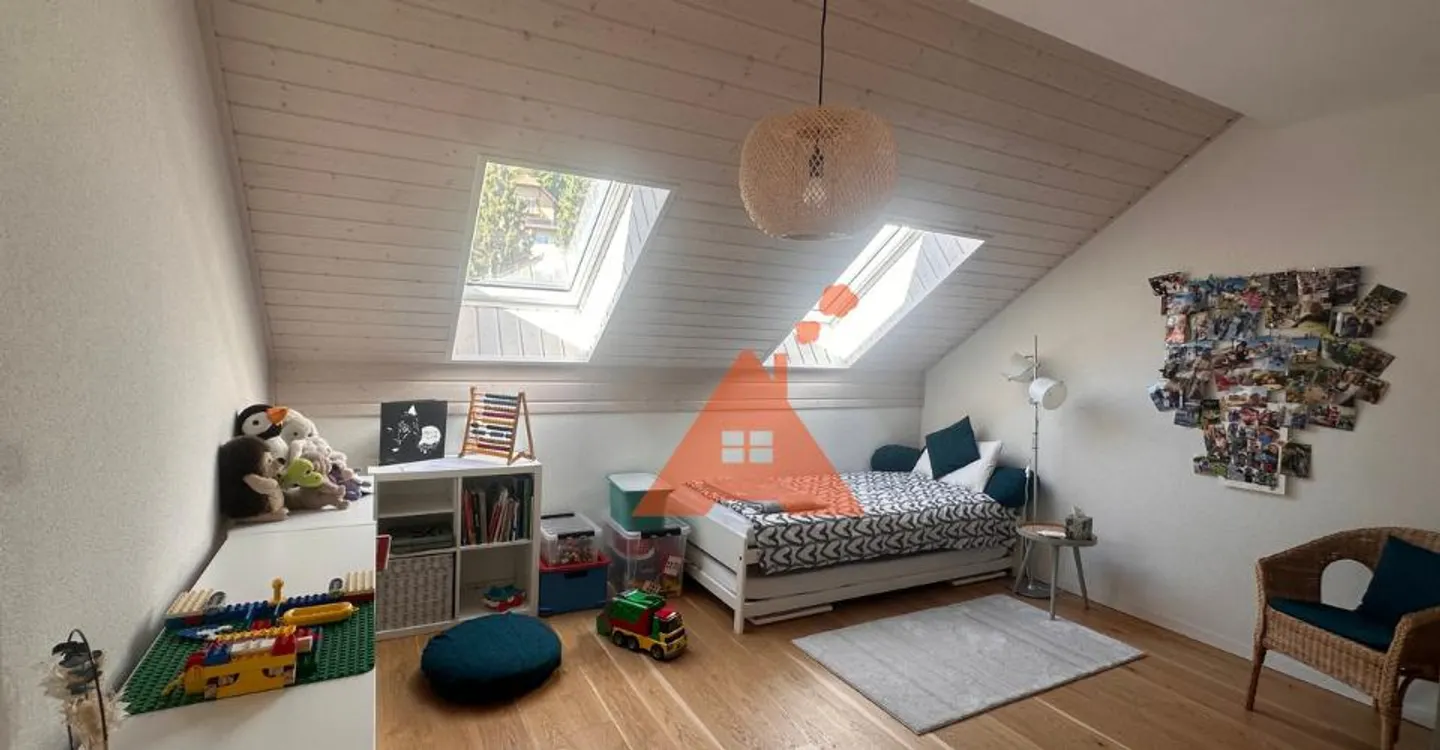 Spacieux duplex de 5,5 pièces sous toiture - Photo 7 sur 10