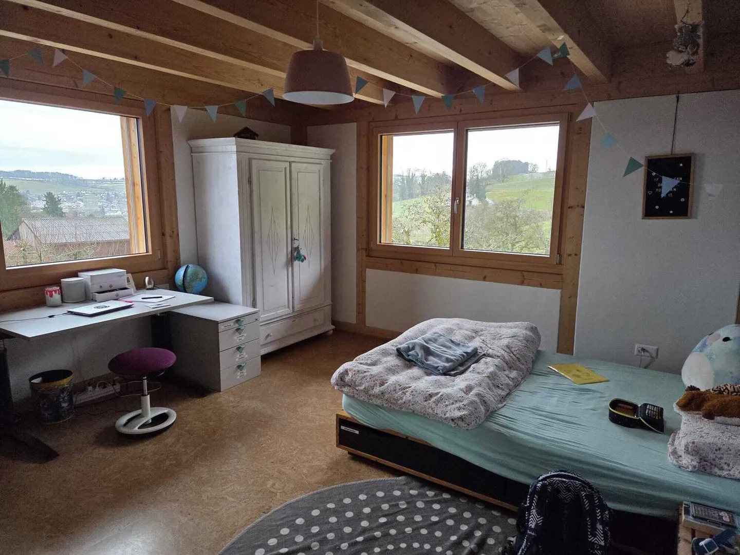 Charmantes Holzhaus mit Garten - Foto 3 von 8