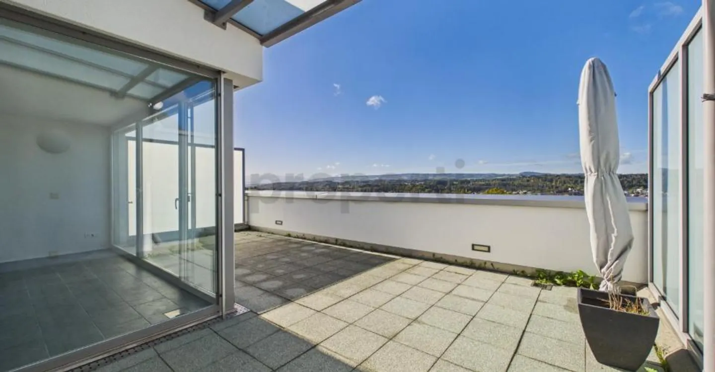 Panoramic terrace with far-reaching views, modern amenities & spacious... - Photo 4 of 13