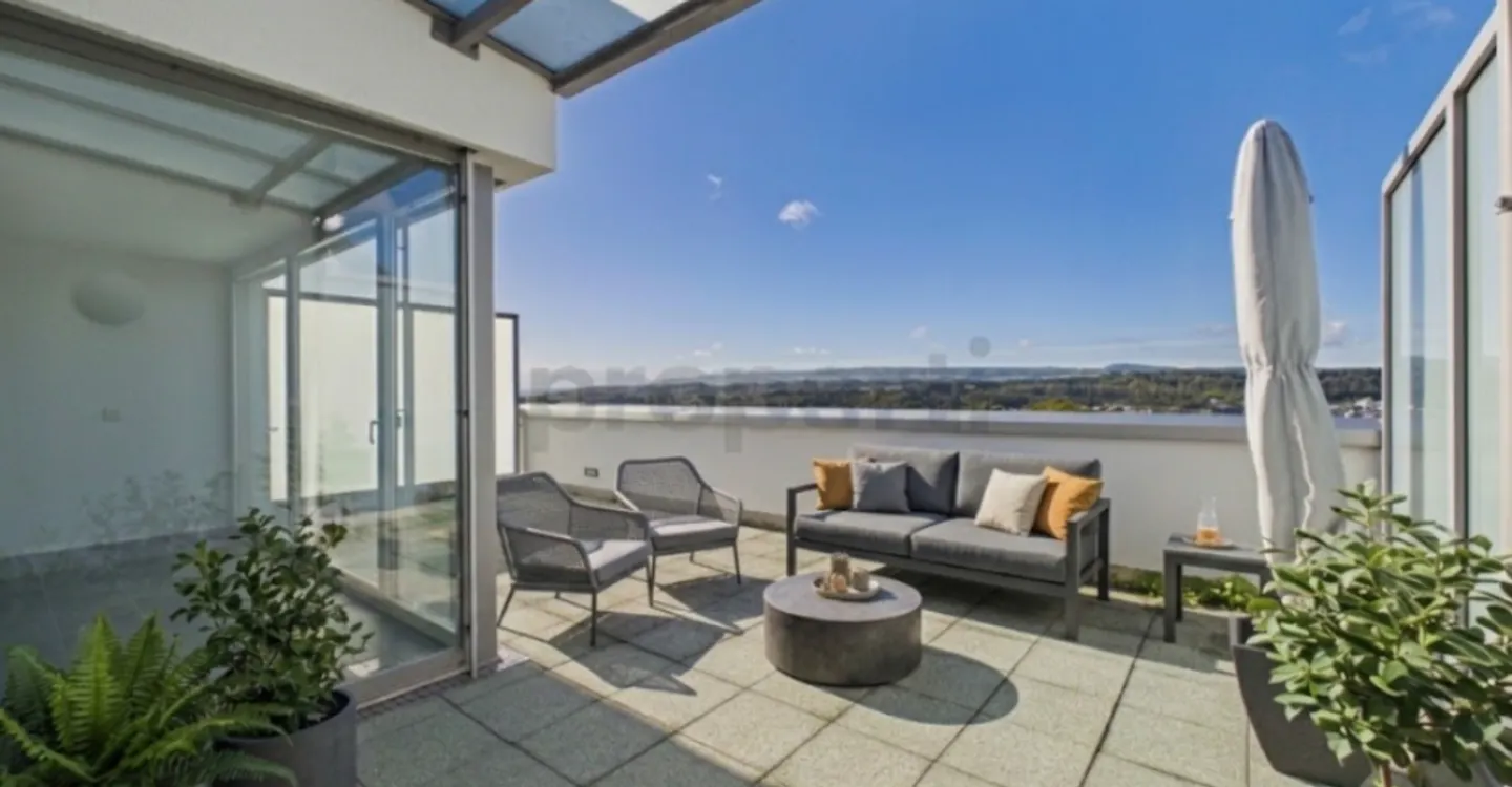 Panoramic terrace with far-reaching views, modern amenities & spacious... - Photo 5 of 13