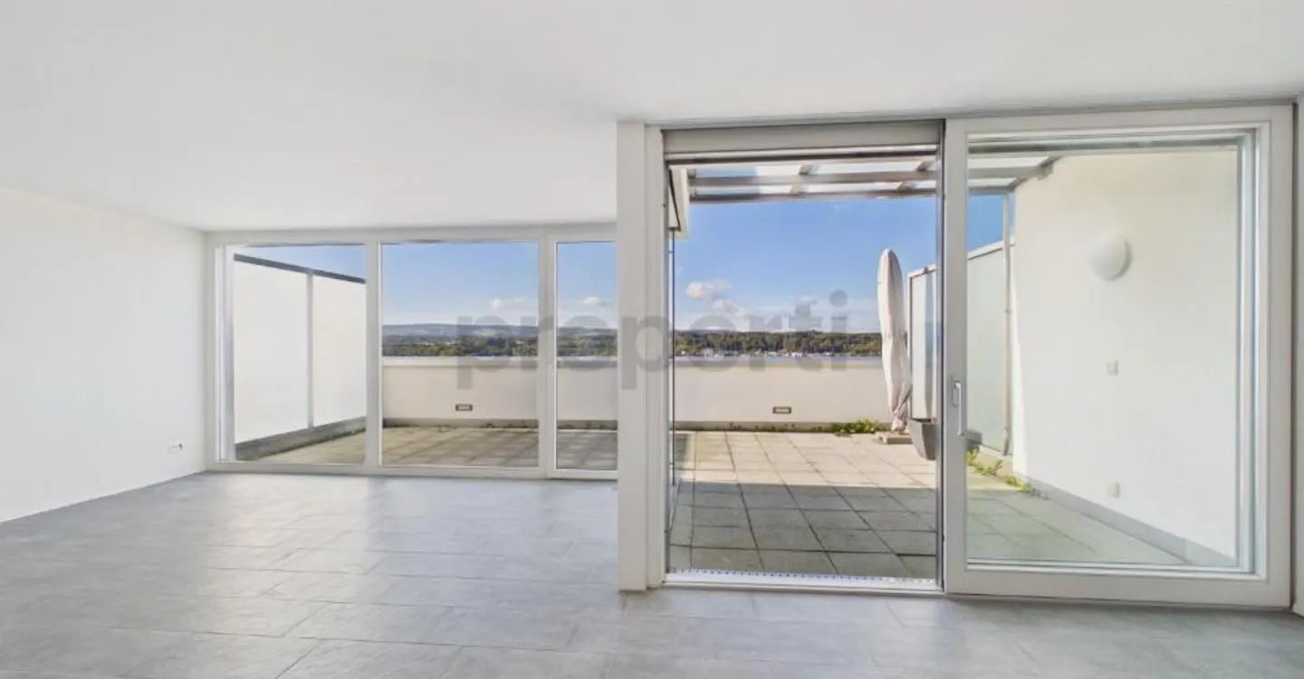 Panoramic terrace with far-reaching views, modern amenities & spacious... - Photo 2 of 13