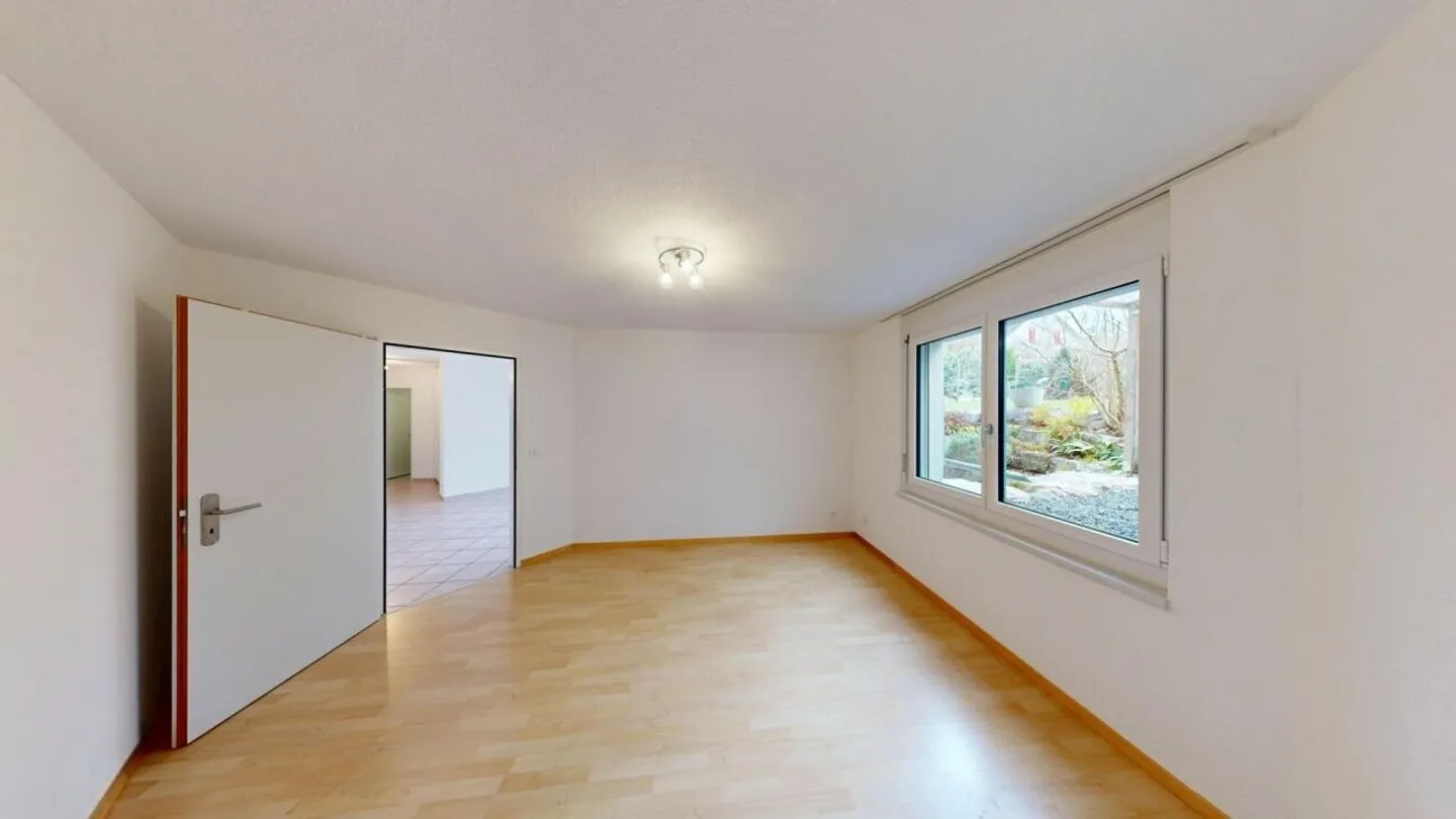 Appartement 3½ pièces confortable avec espace de détente et jardin - Photo 10 sur 19