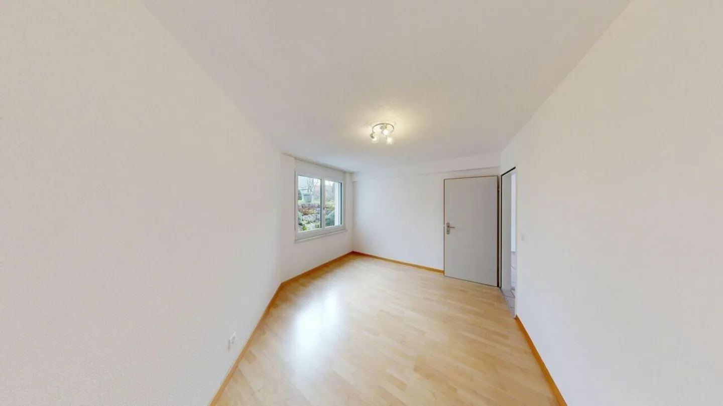 Appartement 3½ pièces confortable avec espace de détente et jardin - Photo 7 sur 19