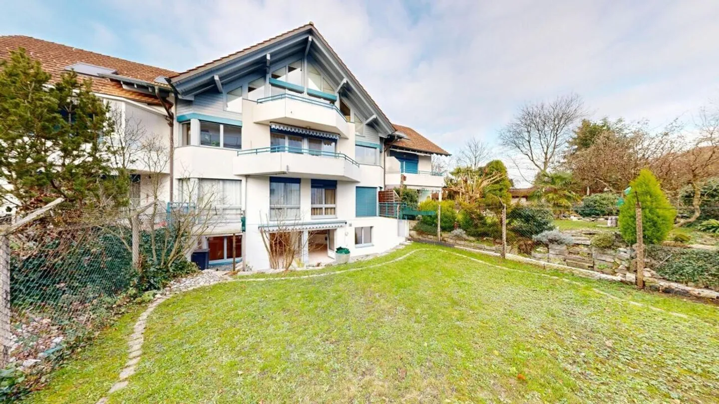 Appartement 3½ pièces confortable avec espace de détente et jardin - Photo 17 sur 19