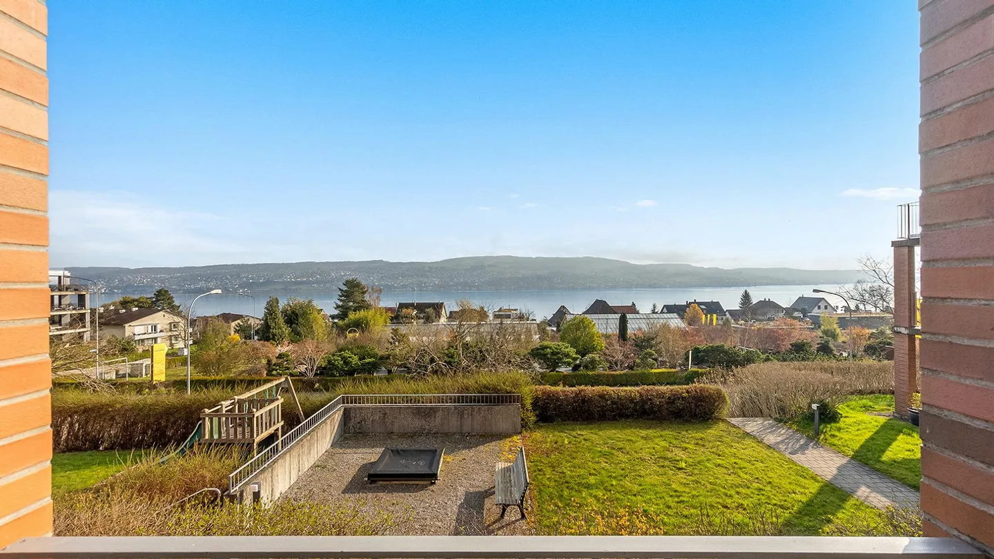 Elegant Apartment with Lake View - Photo 1 of 4