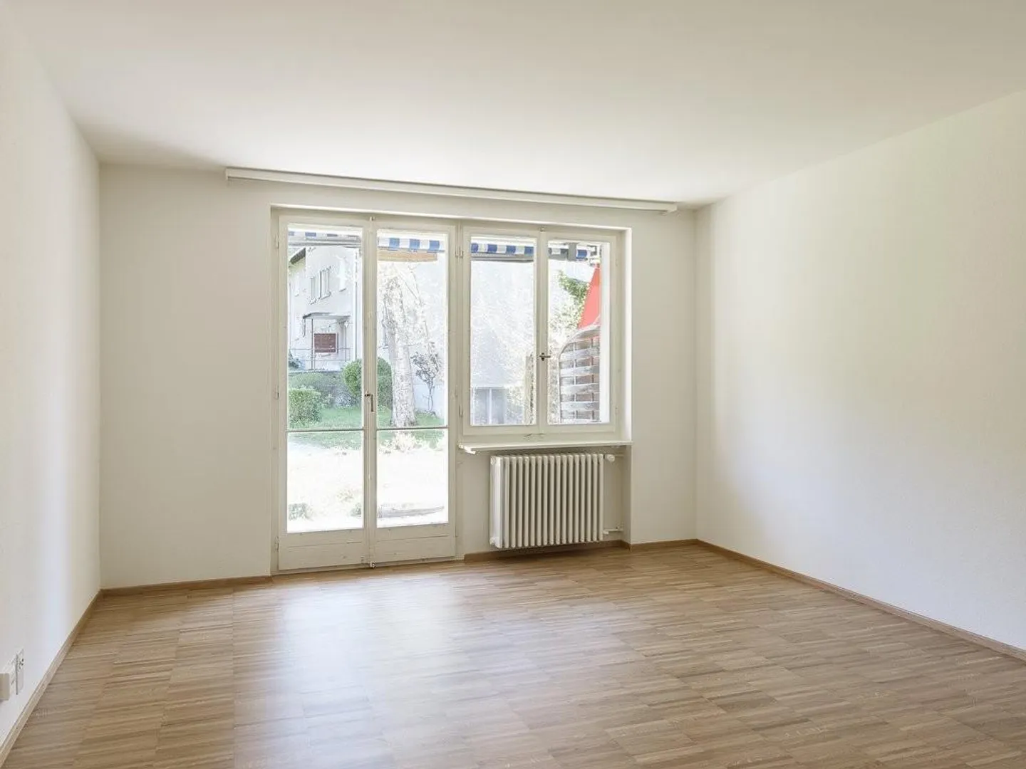 Vivre dans le vert et pourtant central : appartement de 3,5 pièces - Photo 2 sur 8