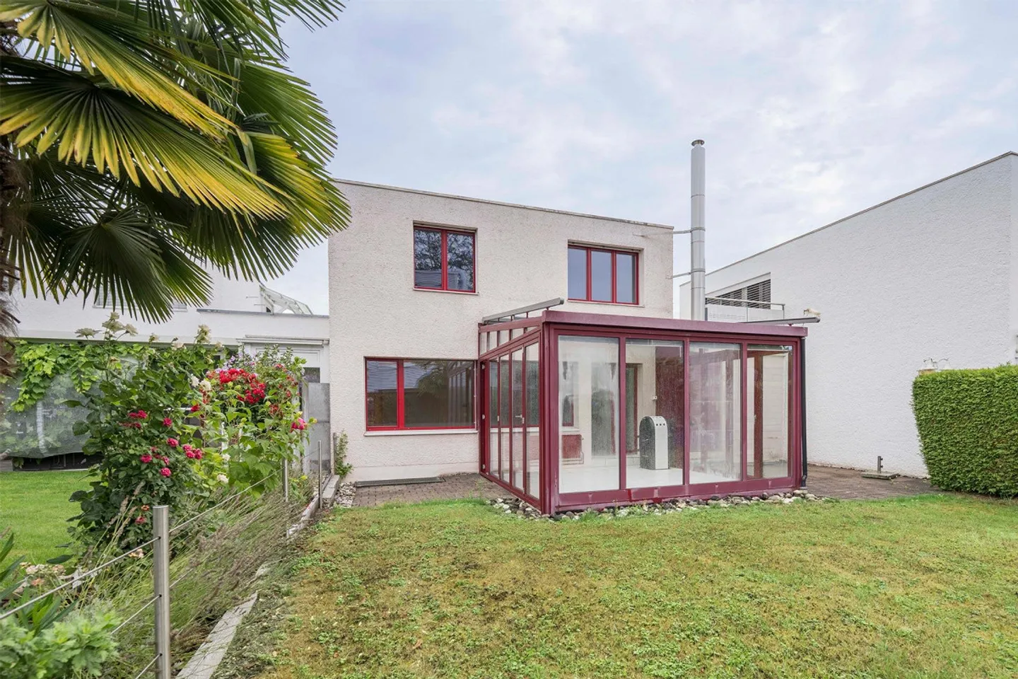 Familienhaus mit Wintergarten - Foto 1 von 13