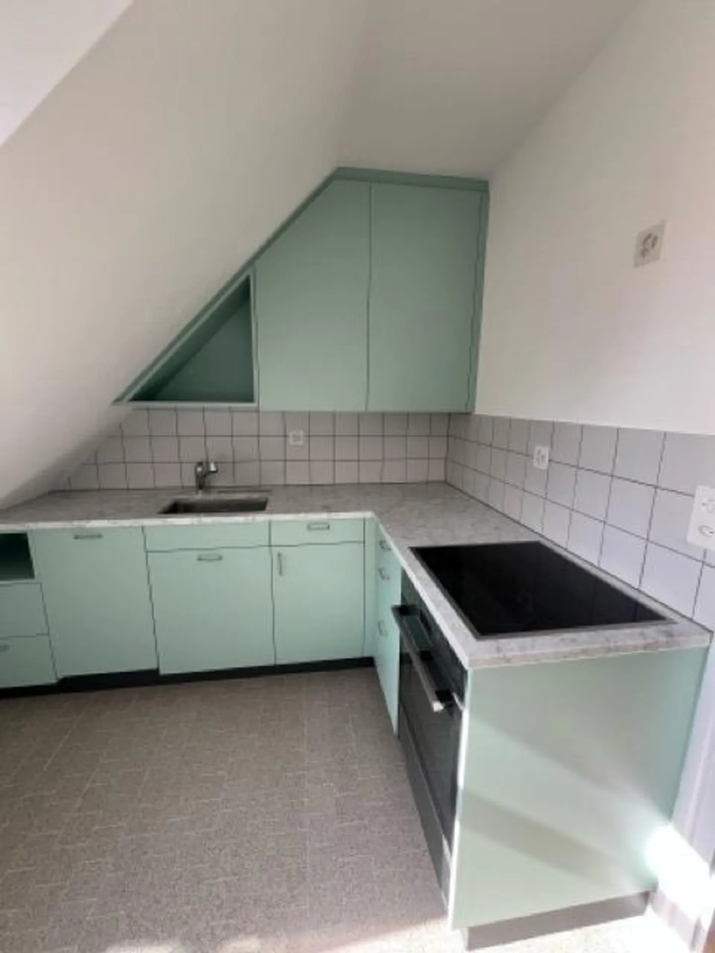 Stylish living under the roof – freshly renovated 2-room apartment with special charm - Photo 8 of 14