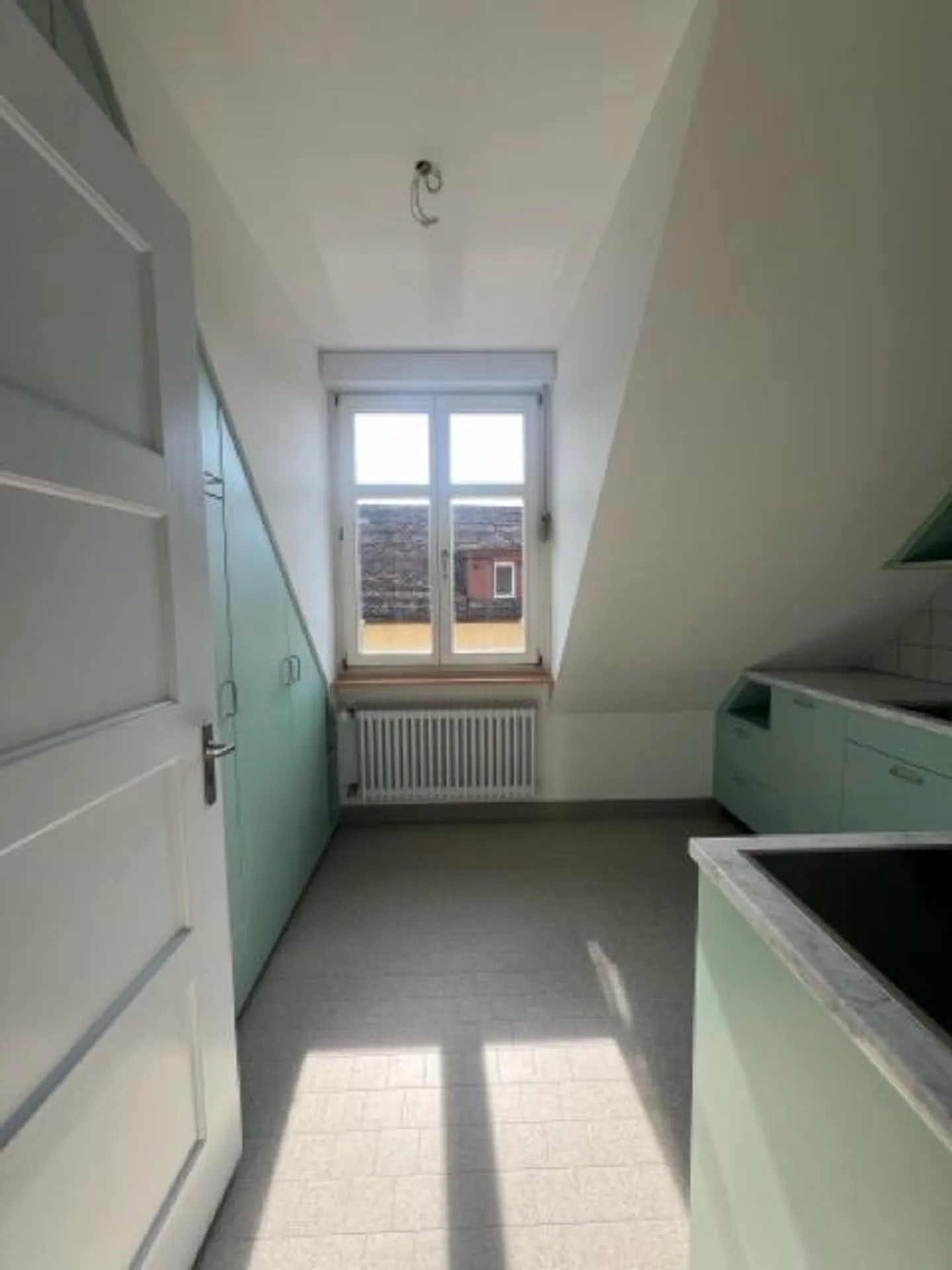Stylish living under the roof – freshly renovated 2-room apartment with special charm - Photo 9 of 14