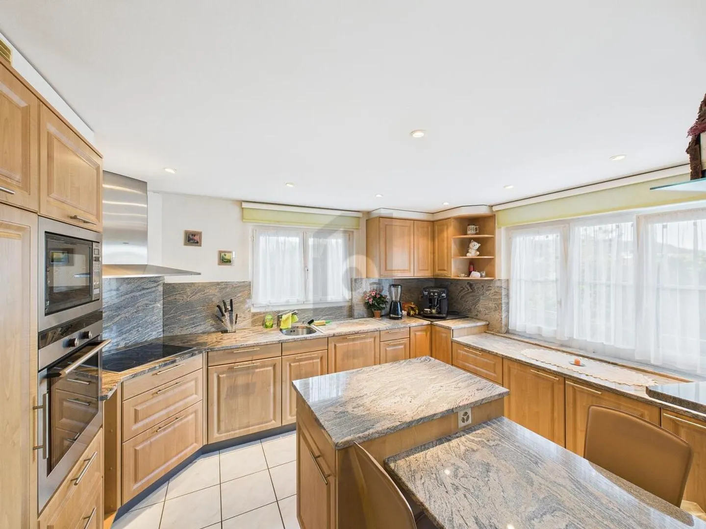 MARBLE KITCHEN AND SPACIOUS OUTDOOR AREA - Photo 2 of 6