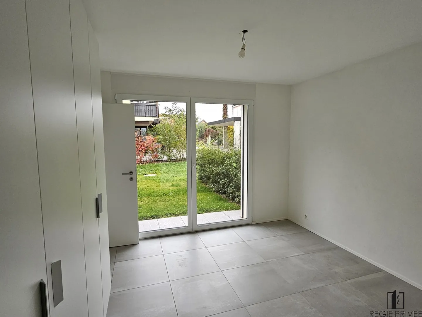 Appartement de 4.5 pièces au rez avec jardin - Photo 5 sur 8