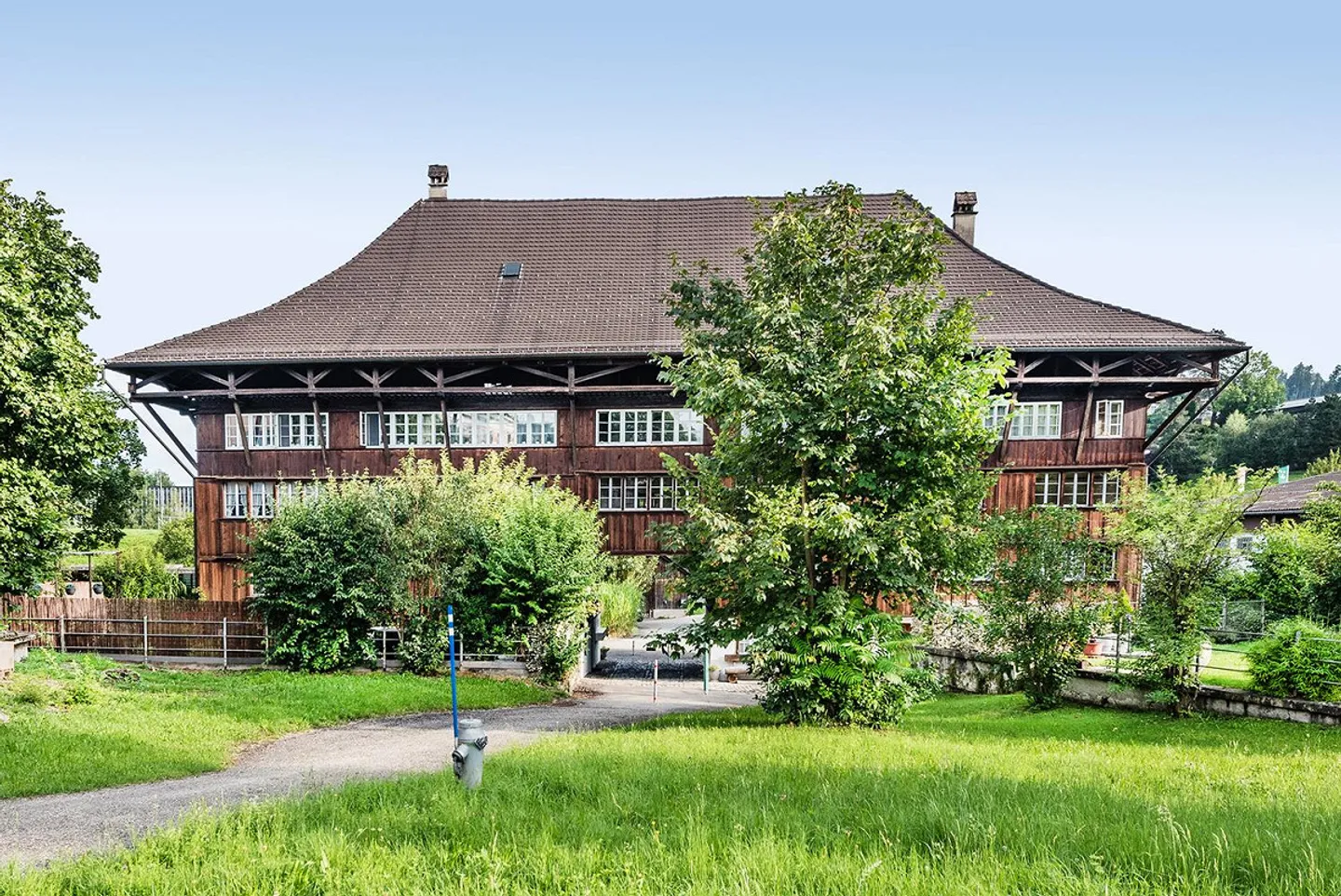 Exclusive 5.5-room apartment with garden and historic charm - Photo 10 of 10