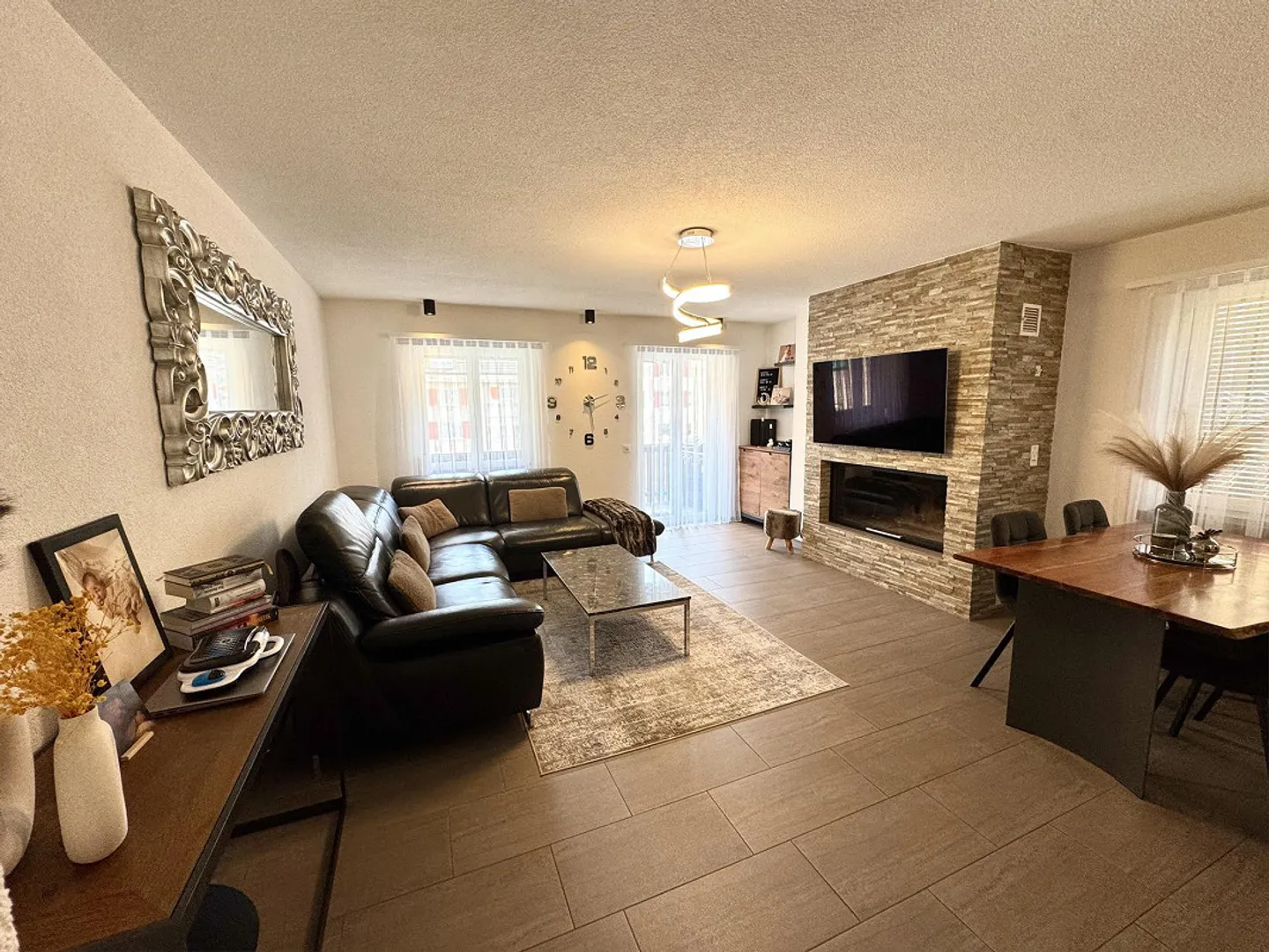 Charming 3.5-room apartment in the center of Mels - Photo 2 of 9