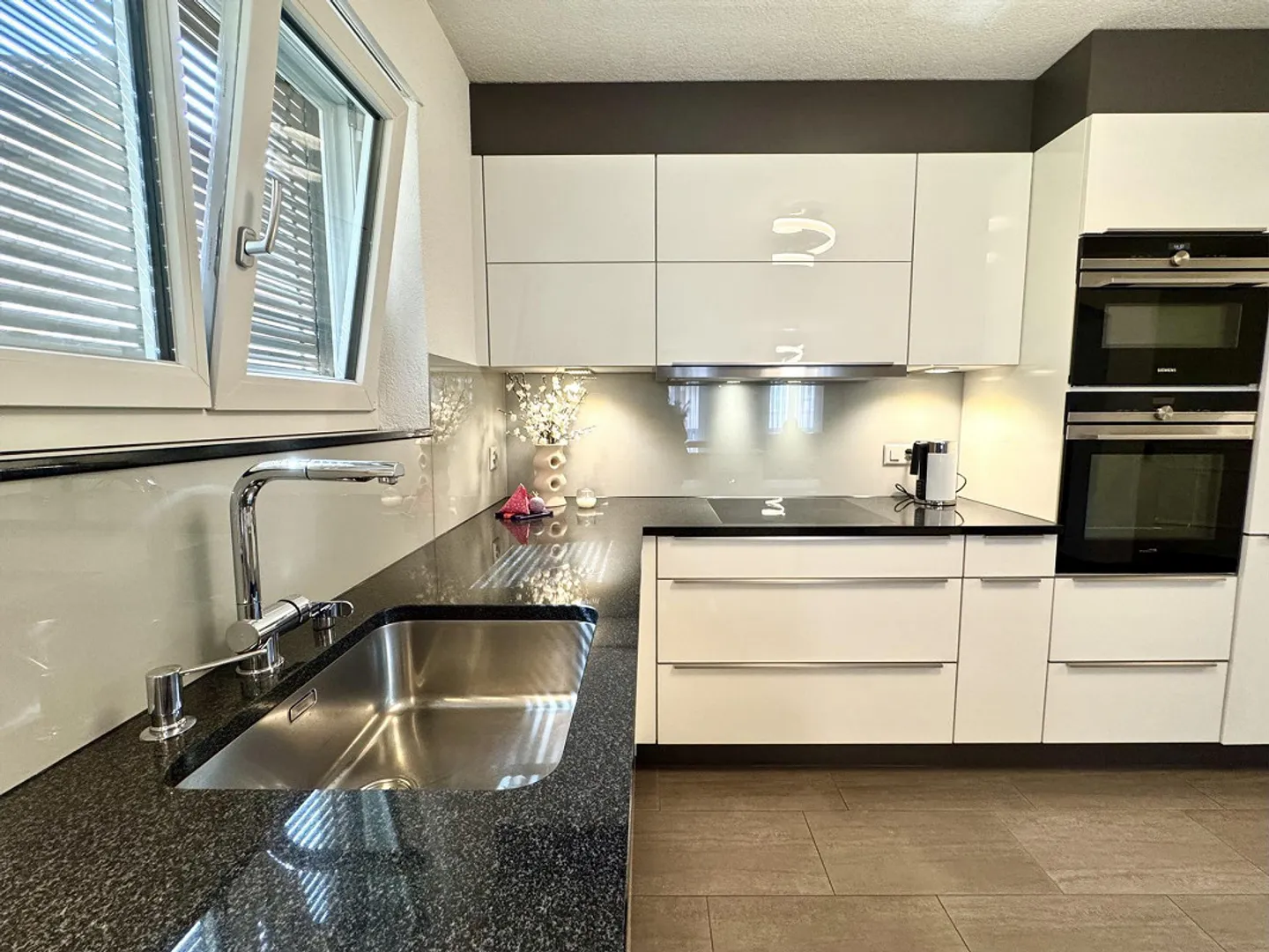 Charming 3.5-room apartment in the center of Mels - Photo 1 of 9