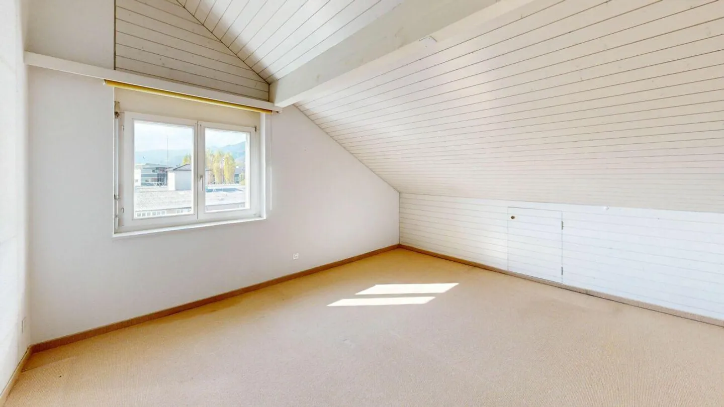 Charmante Dachwohnung mit Aussicht - Foto 6 von 12