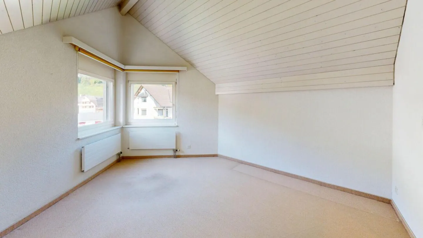 Charmante Dachwohnung mit Aussicht - Foto 7 von 12