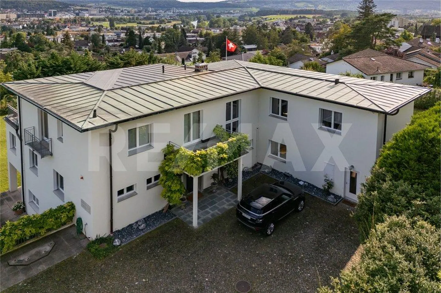 Exklusive Villa mit 13 Zimmern an bester Lage in Unterengstringen - Foto 2 von 13