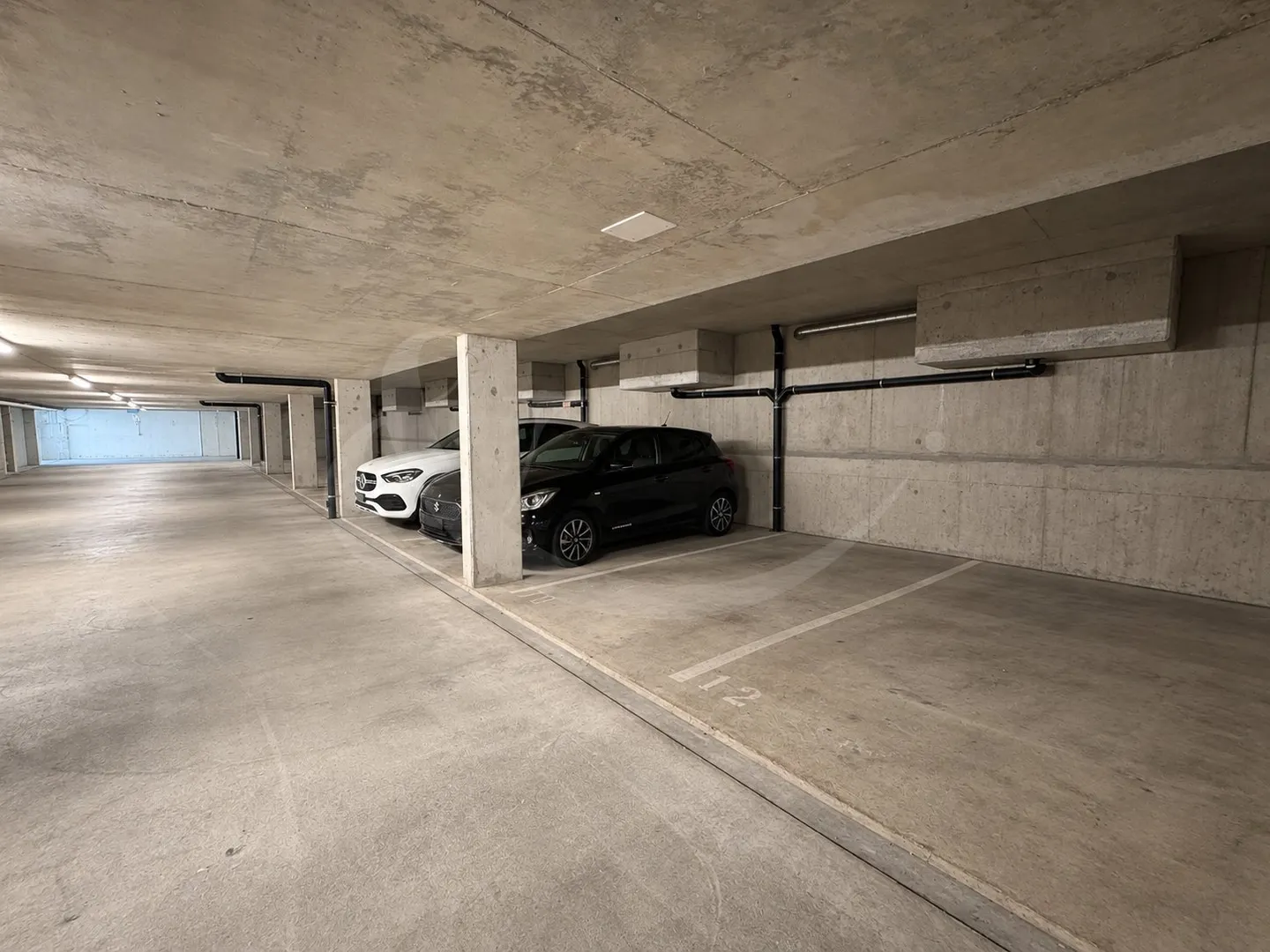 Place de parking - Opportunité d'investissement - Grand-Saconnex - Photo 1 sur 4