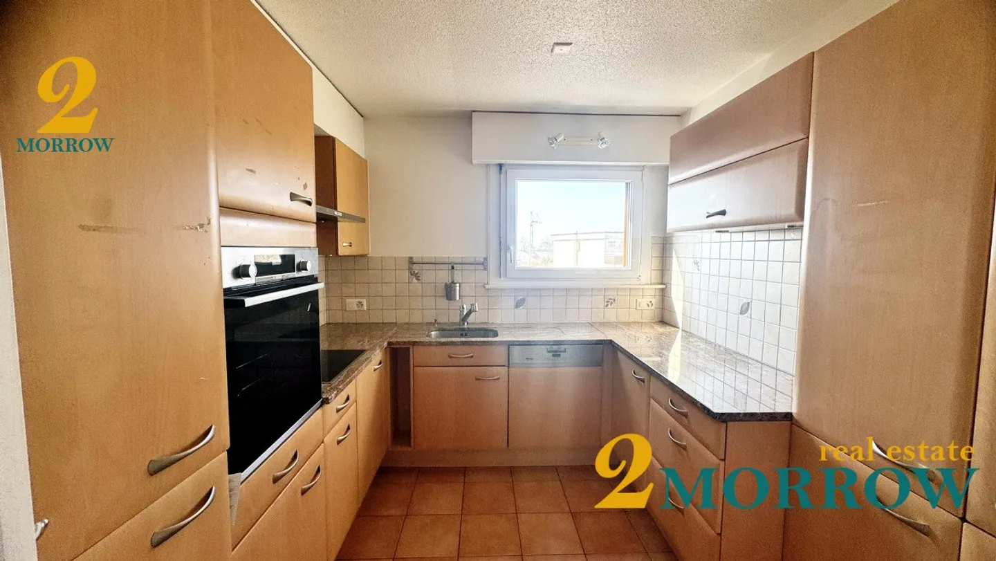 Helles Penthouse mit 4,5 Zimmern und Blick im Herzen von Rolle - Foto 3 von 8