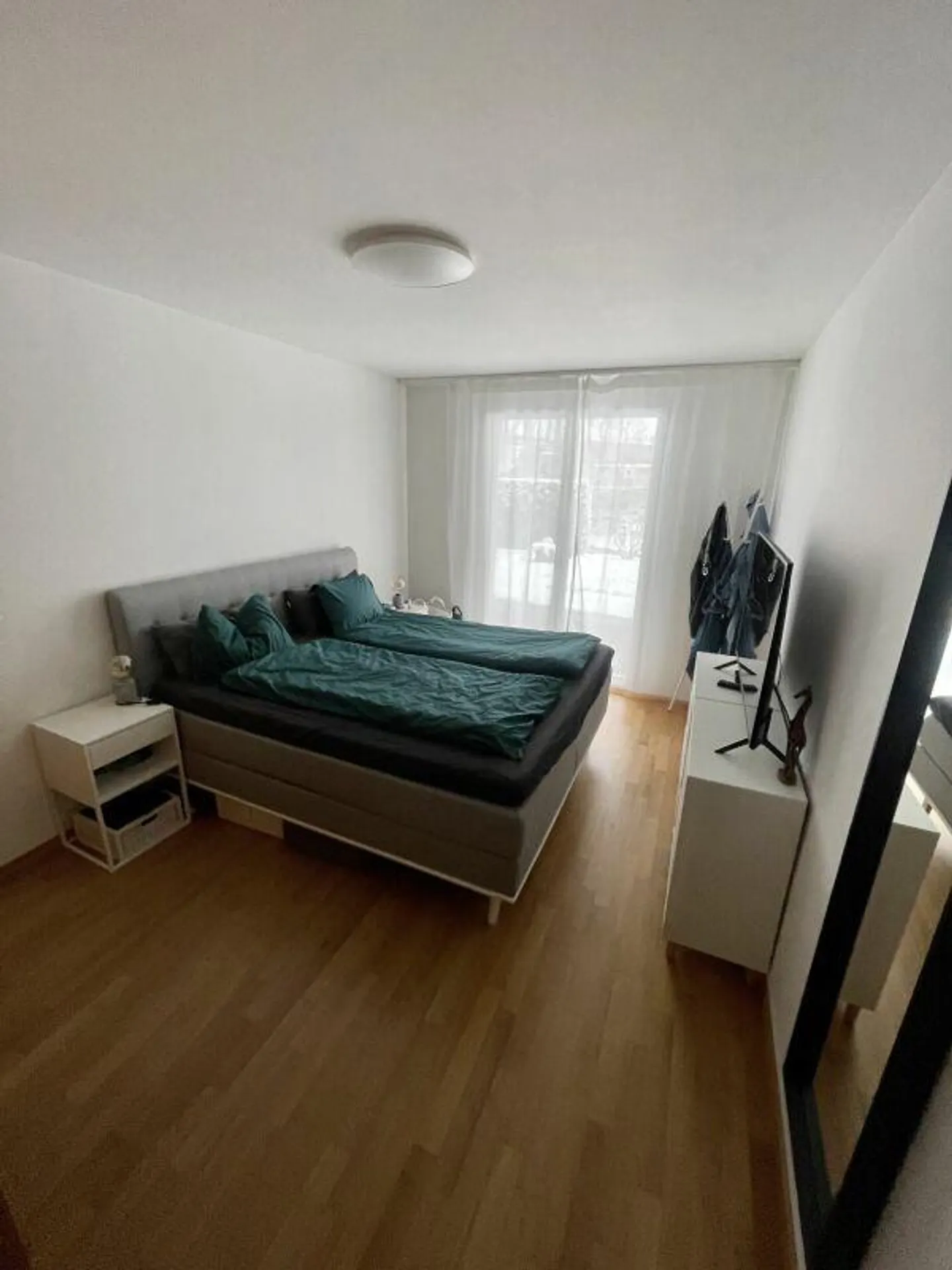 Ampio appartamento di 3,5 locali con area giardino in una zona residenziale tranquilla - Foto 6 di 7