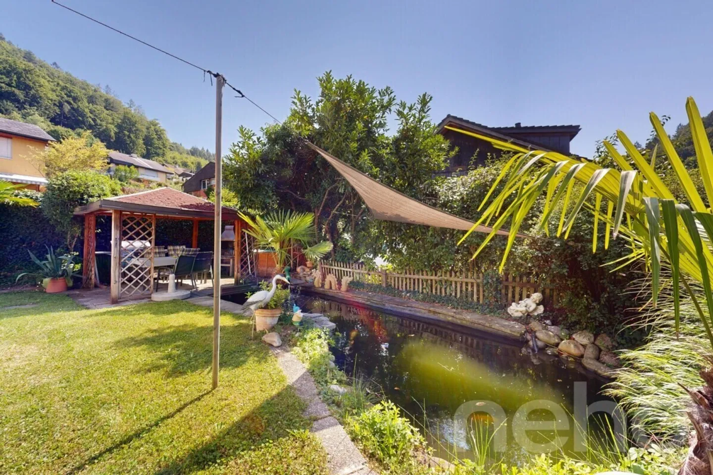 Maison individuelle de 5,5 pièces avec jardin, étang et options polyvalentes - Photo 11 sur 12