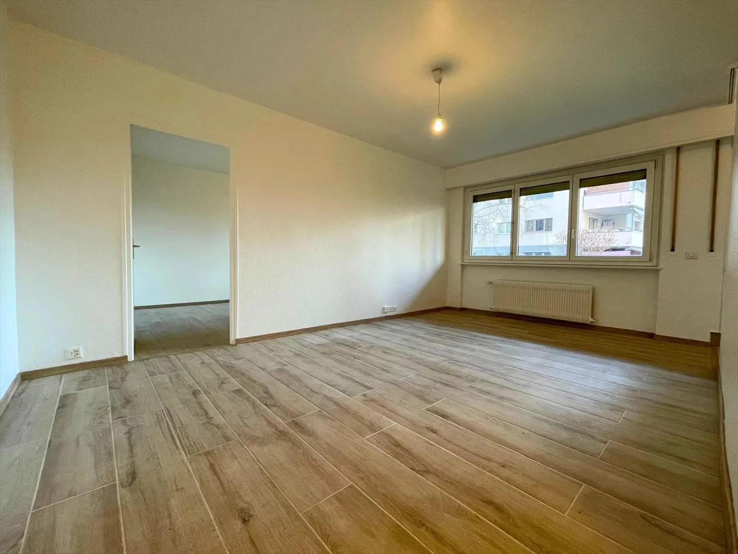 Appartement deux pièces au sous-sol - Photo 3 sur 7