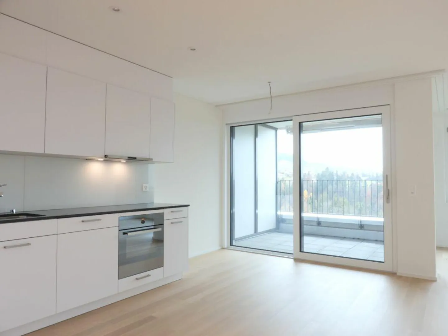 Appartement 2,5 pièces avec terrasse - Photo 8 sur 9
