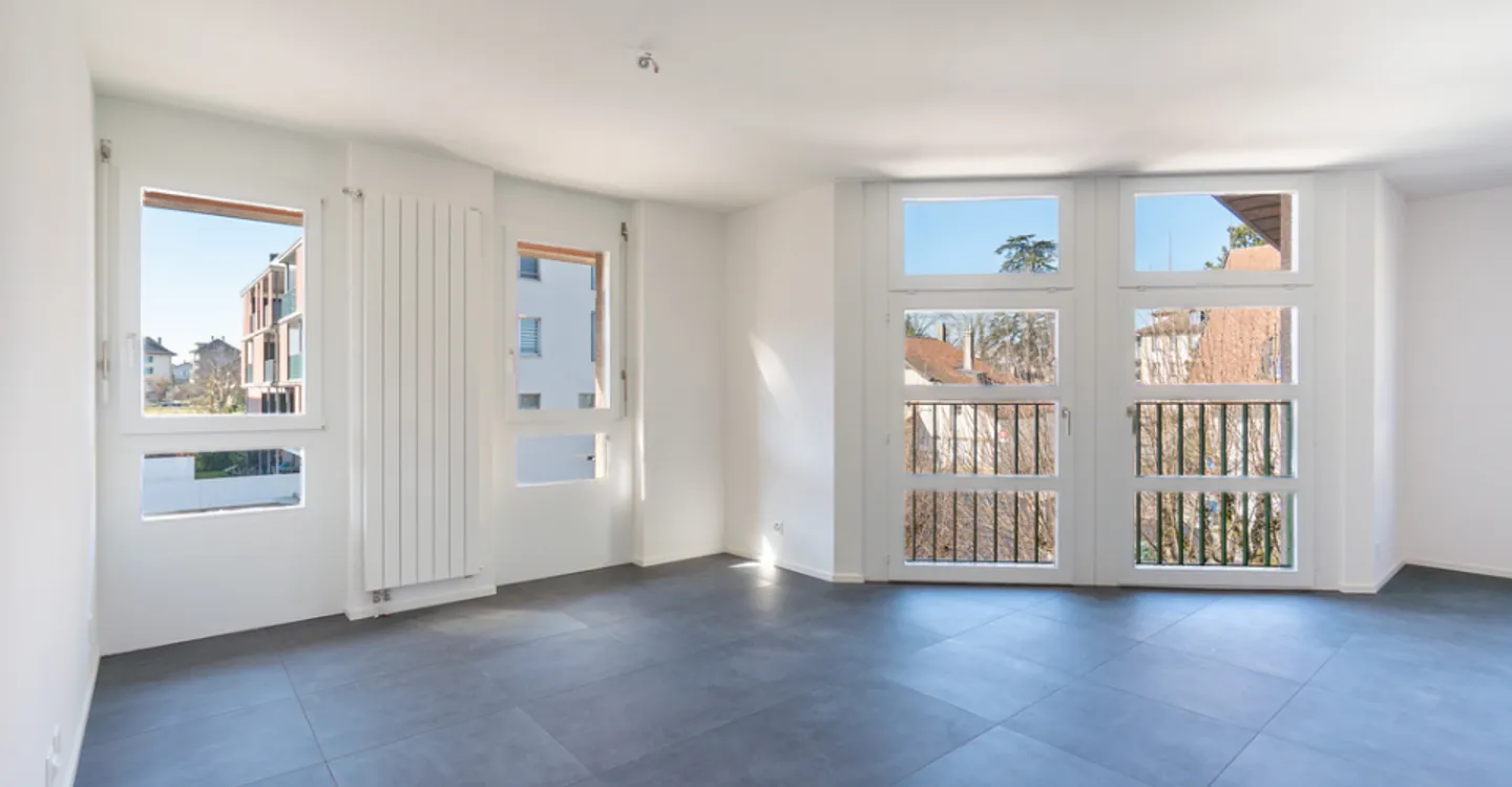 Appartement spacieux 2.5 pièces - Photo 2 sur 8