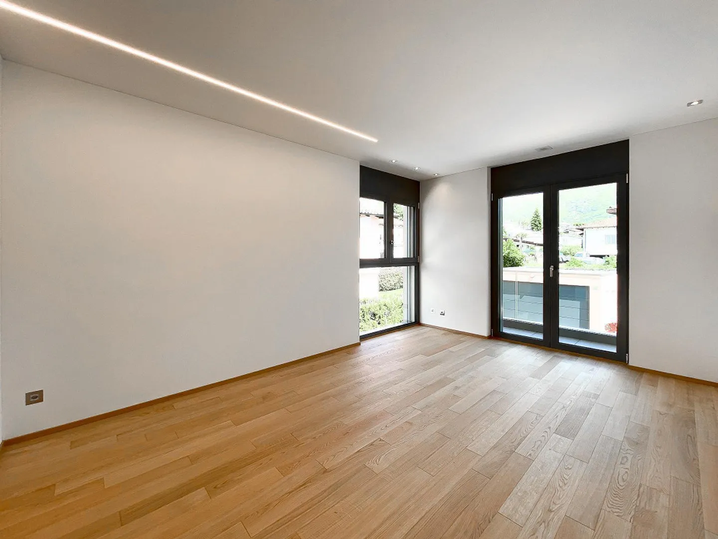 Appartement moderne de 3,5 pièces en première position à Comano - Photo 3 sur 8
