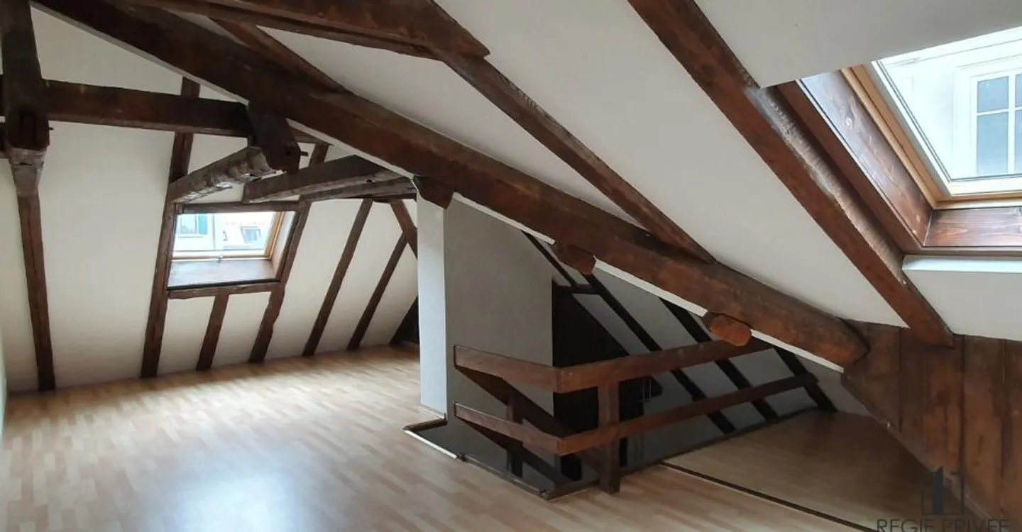 Appartement Charmant au Centre-Ville - Photo 1 sur 8