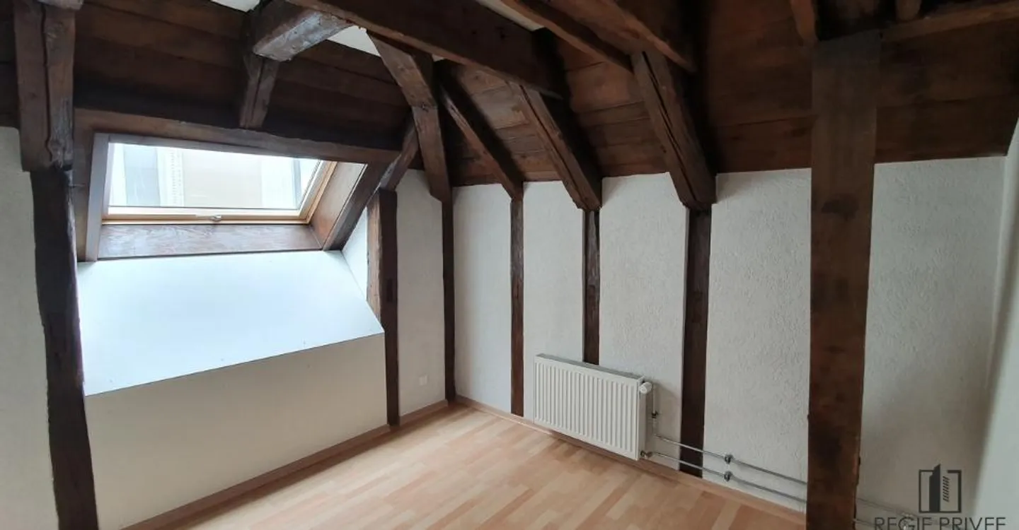 Appartement Charmant au Centre-Ville - Photo 4 sur 8